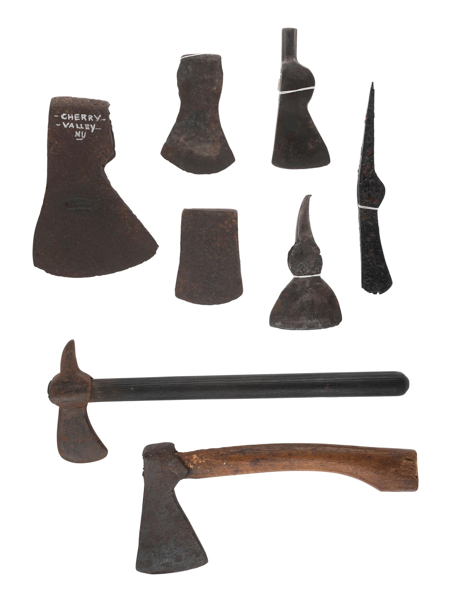 [NATIVE AMERICANS - RELICS]. Group of excavated tomahawks, strikers, and other edged weapons.
