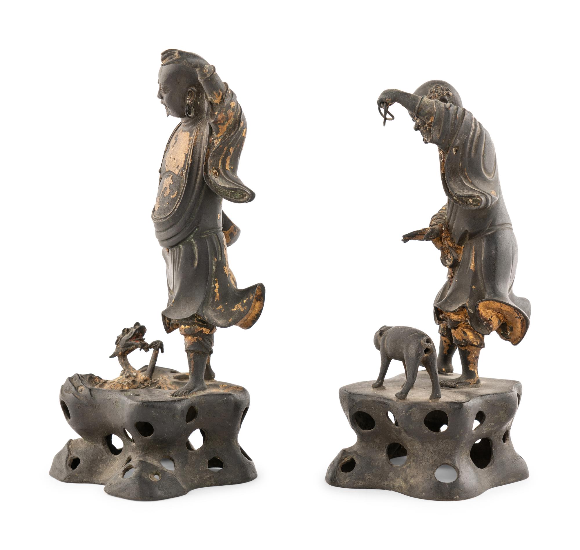 A Pair of Chinese Parcel-Gilt Bronze Figures of Luohan