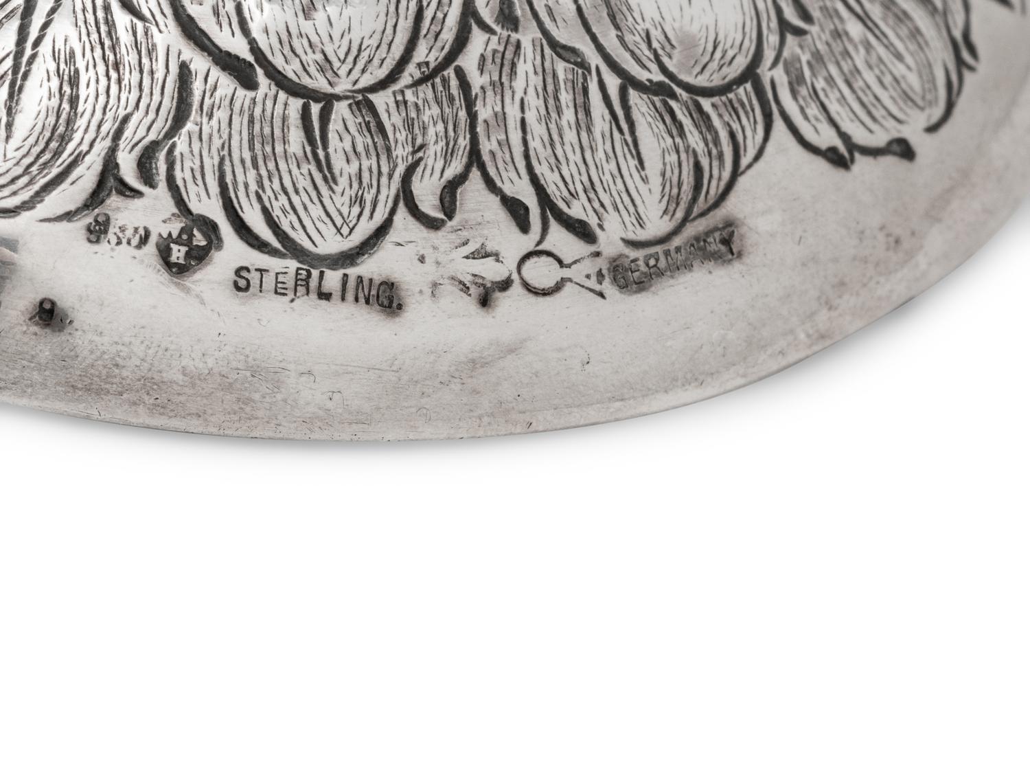 A German Silver-Mounted Glass Eagle-Form Decanter