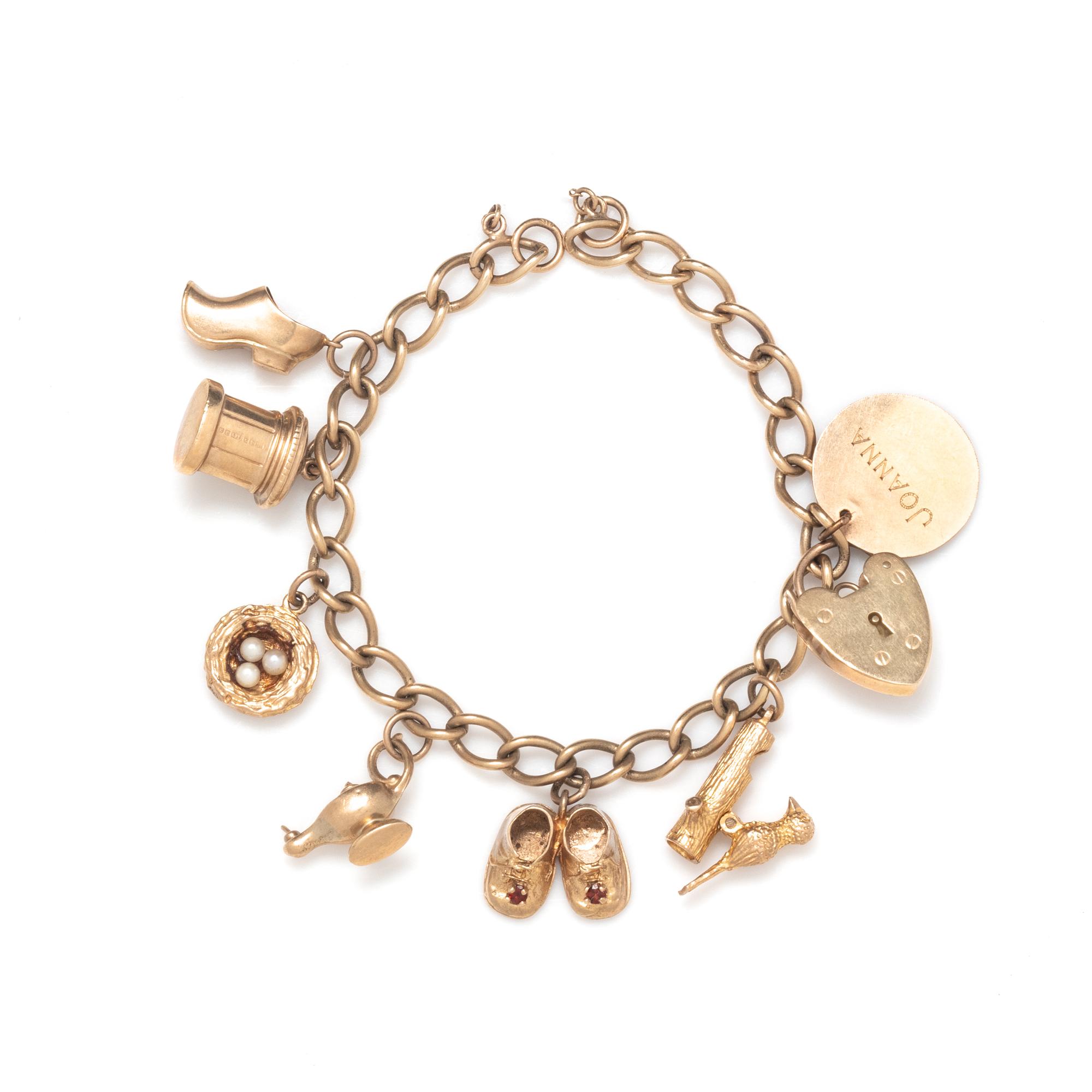 ENGLISH, LOW KARAT YELLOW GOLD CHARM BRACELET