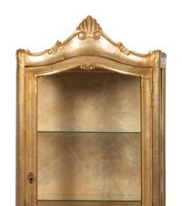 A Silvered Wood Vitrine Cabinet on Three Drawer Bombe Commode Base