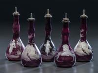 Five 'Mary Gregory' Enameled Amethyst Barber Bottles