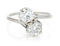 A Platinum, White Gold and Diamond Toi-et-Moi Ring, 2.20 dwts.