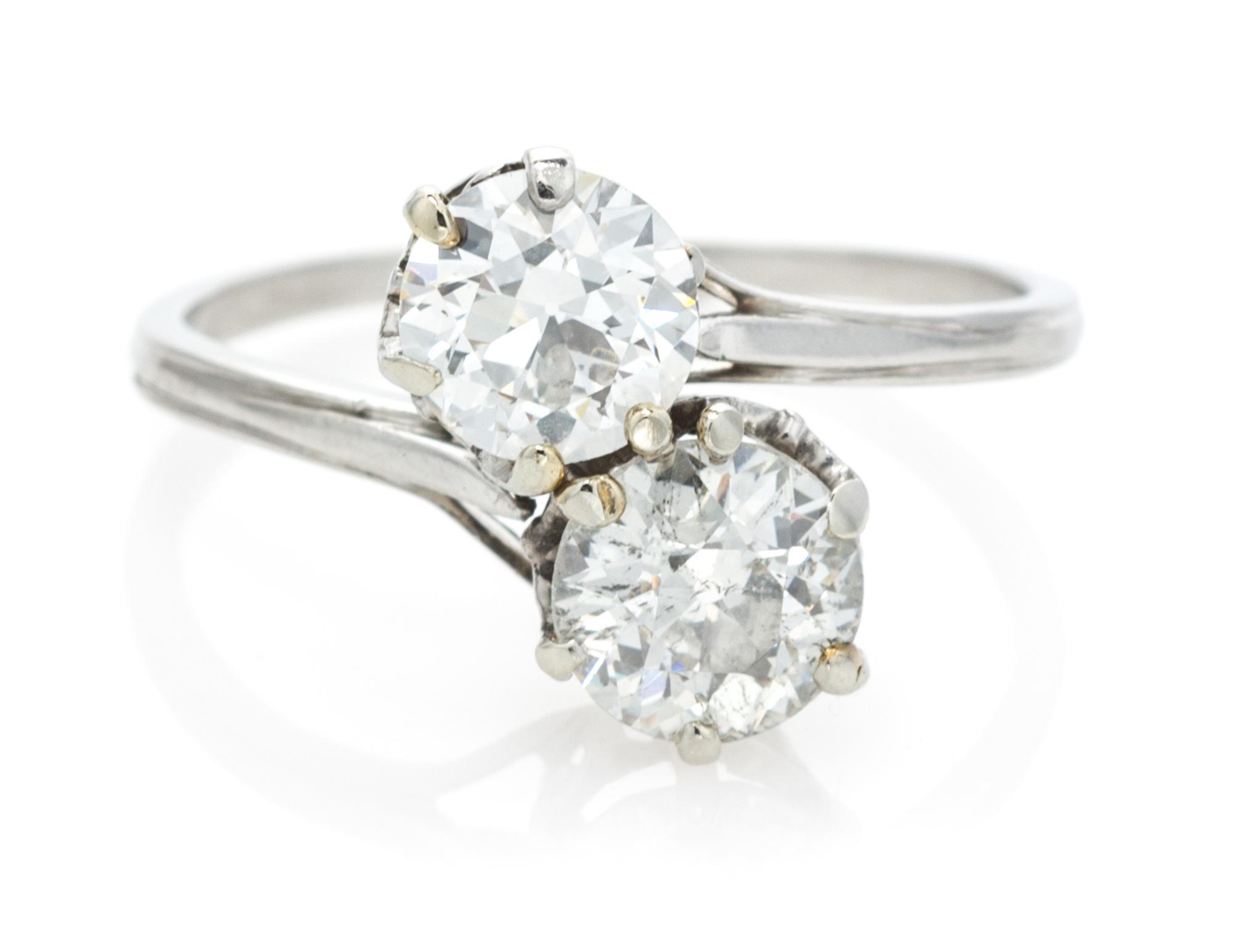 A Platinum, White Gold and Diamond Toi-et-Moi Ring, 2.20 dwts.