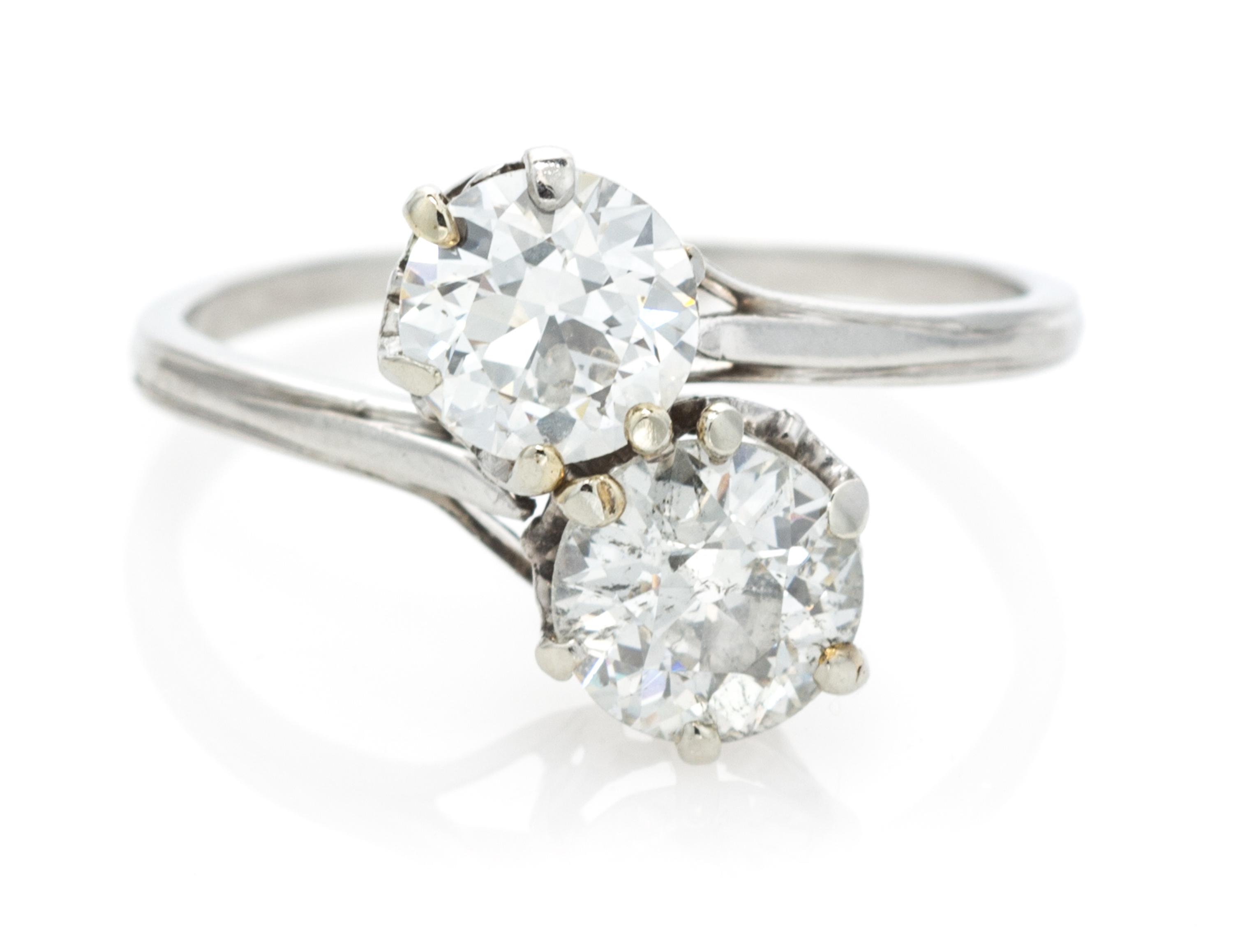 A Platinum, White Gold and Diamond Toi-et-Moi Ring, 2.20 dwts.