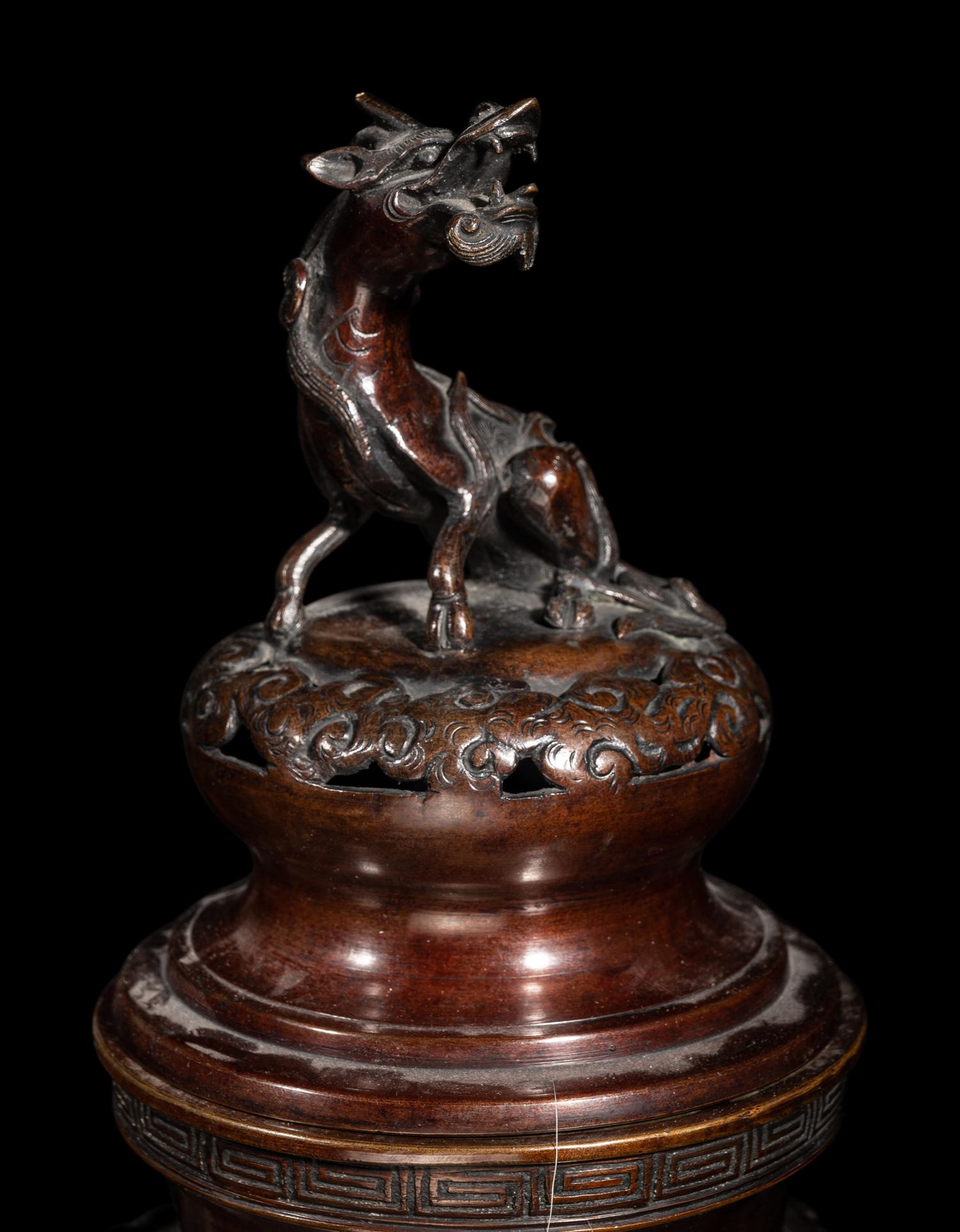 Two Japanese Pagoda-Form Bronze Lanterns and A Bronze Incense Burner