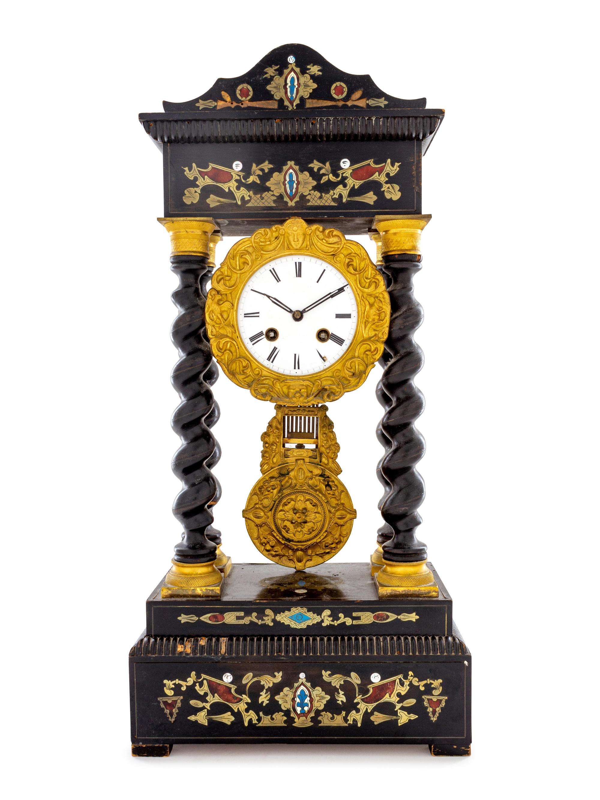 A Continental Ebonized and Brass Inlaid Portico Clock