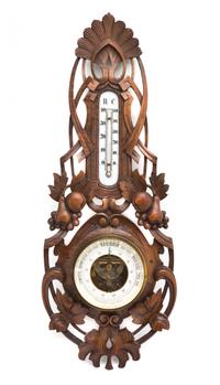 A Black Forest Style Carved Barometer, G. Schoonhen, Height 23 1/4 inches.