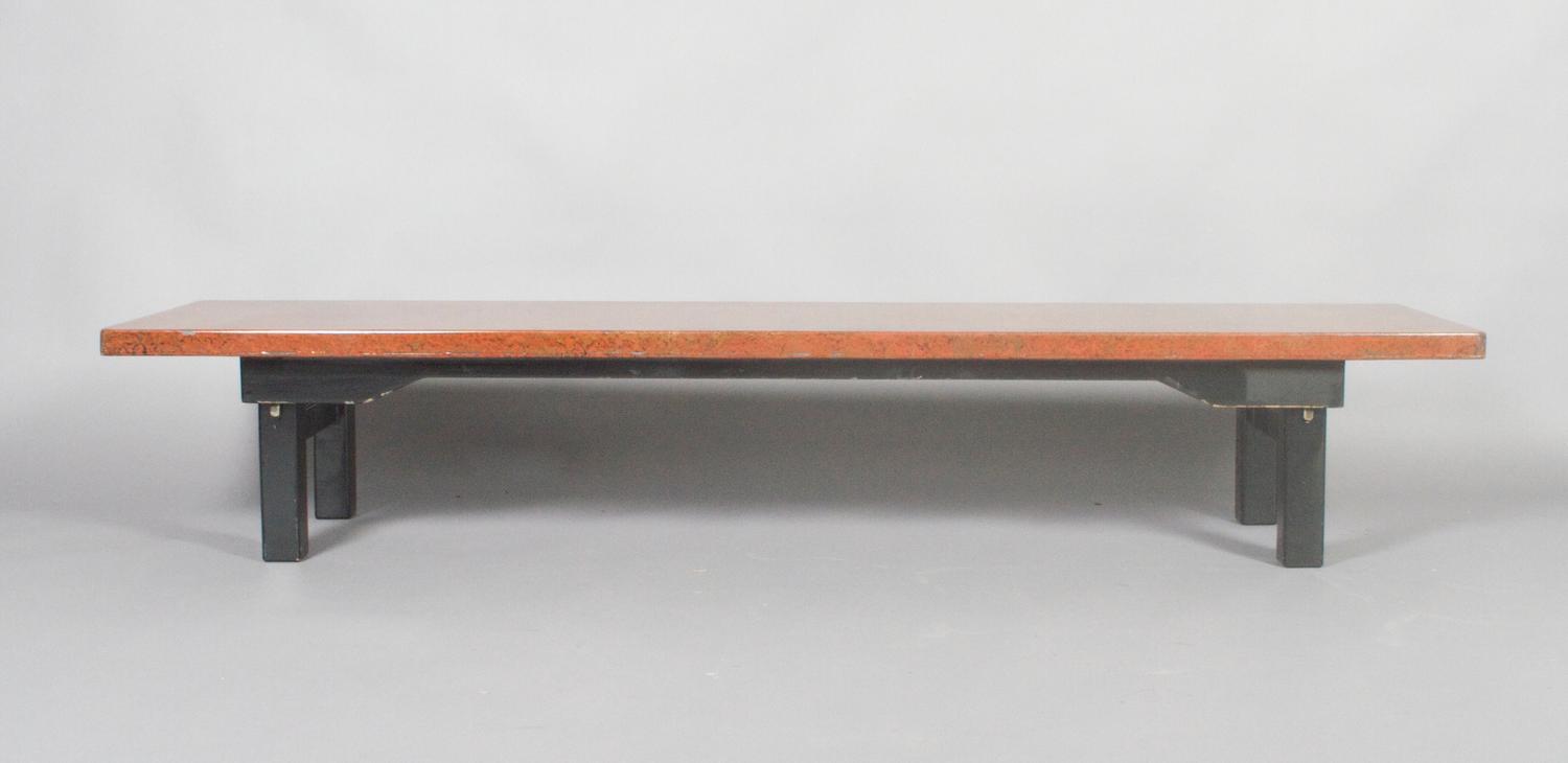 A Japanese Lacquered Low Table, Height 12 1/2 x width 71 x depth 17 3/4 inches.