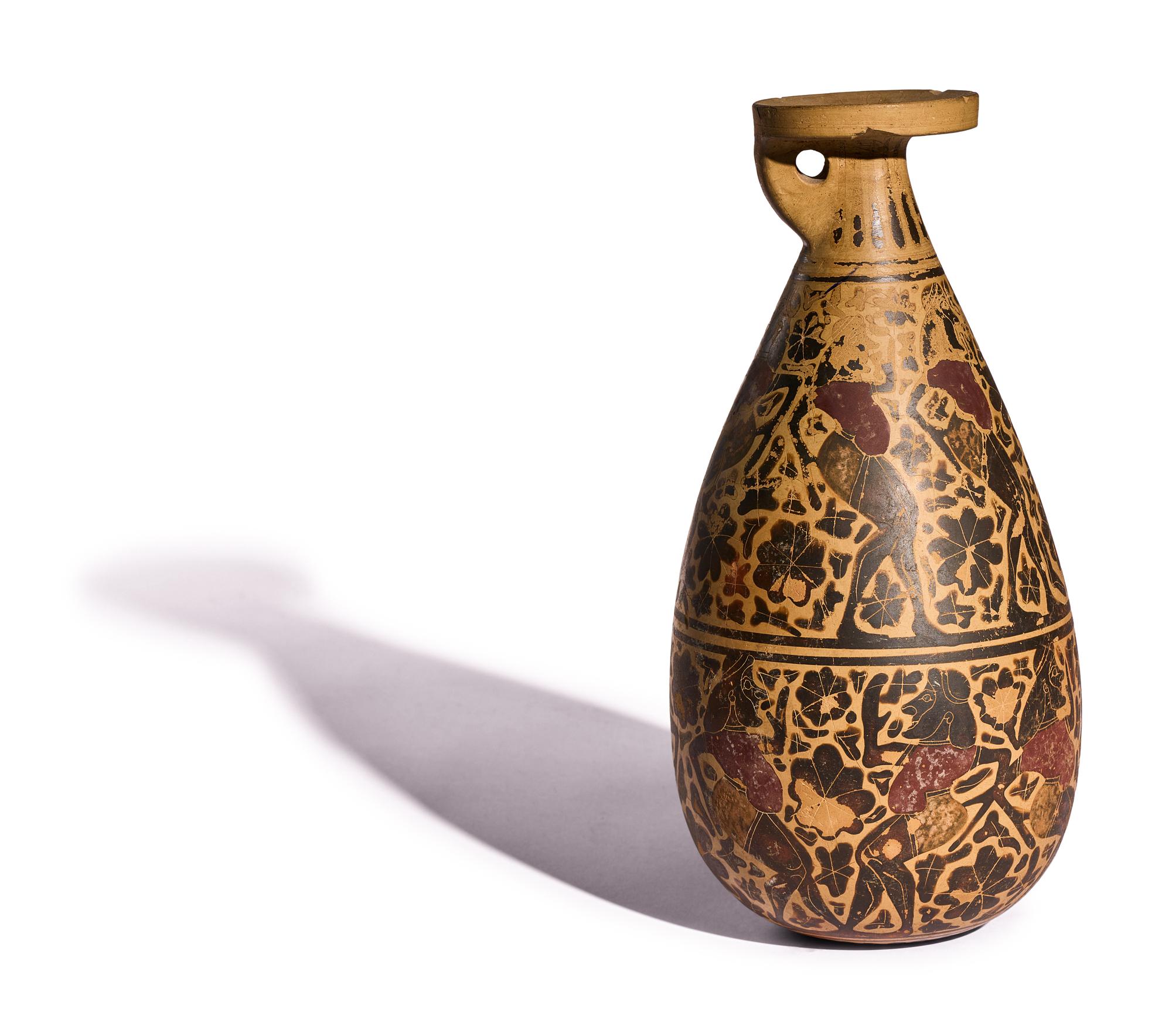 A Corinthian Black-Figured Alabastron with Padded Dancers