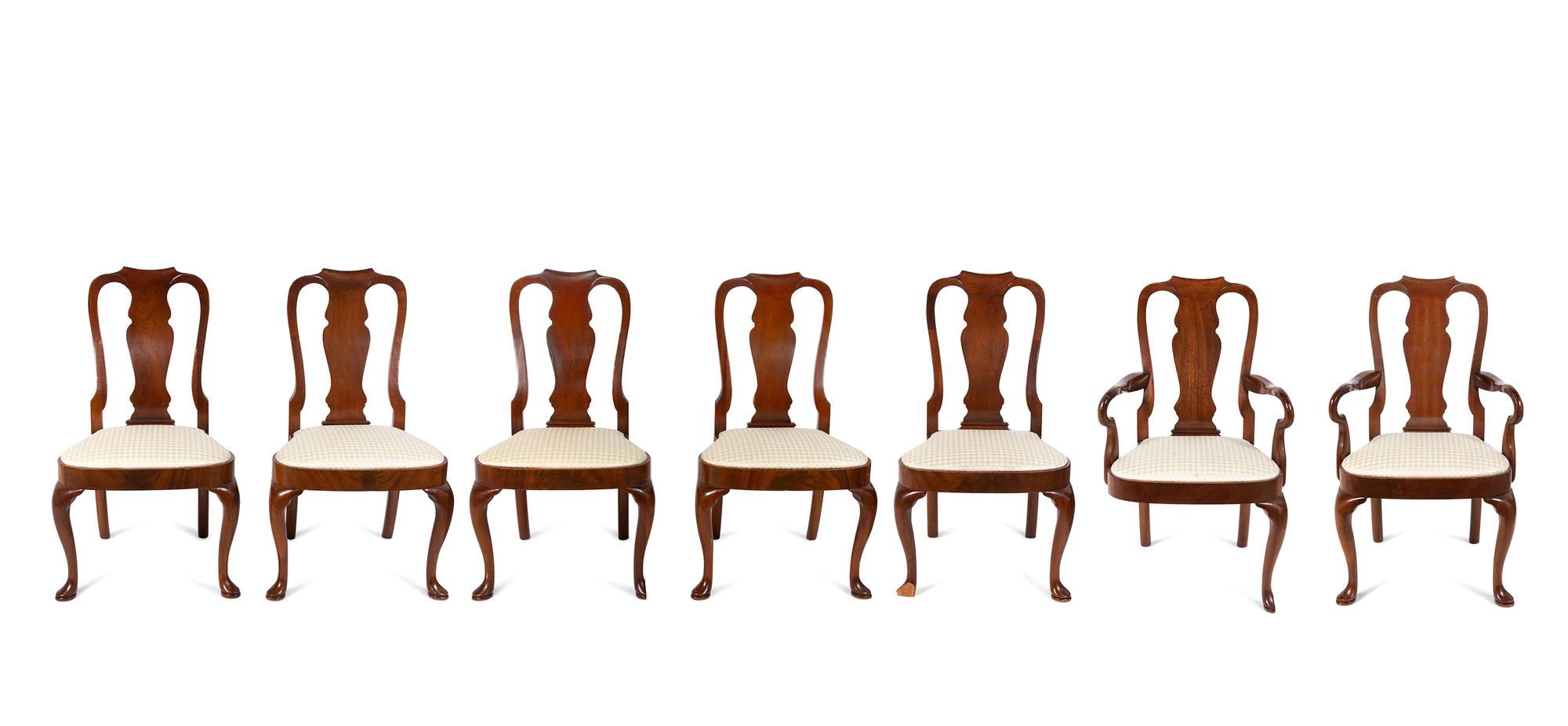 A Set of Seven Queen Anne Style Mahogany Dining Chairs