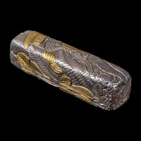 A Chinese Parcel-Gilt Silver Repoussé 'Plantain Leaves' Rectangular Scroll Box, Incised Qianlong Mark 清乾隆乙卯（1796）銀鎏金鏨蕉葉紋手卷機關盒