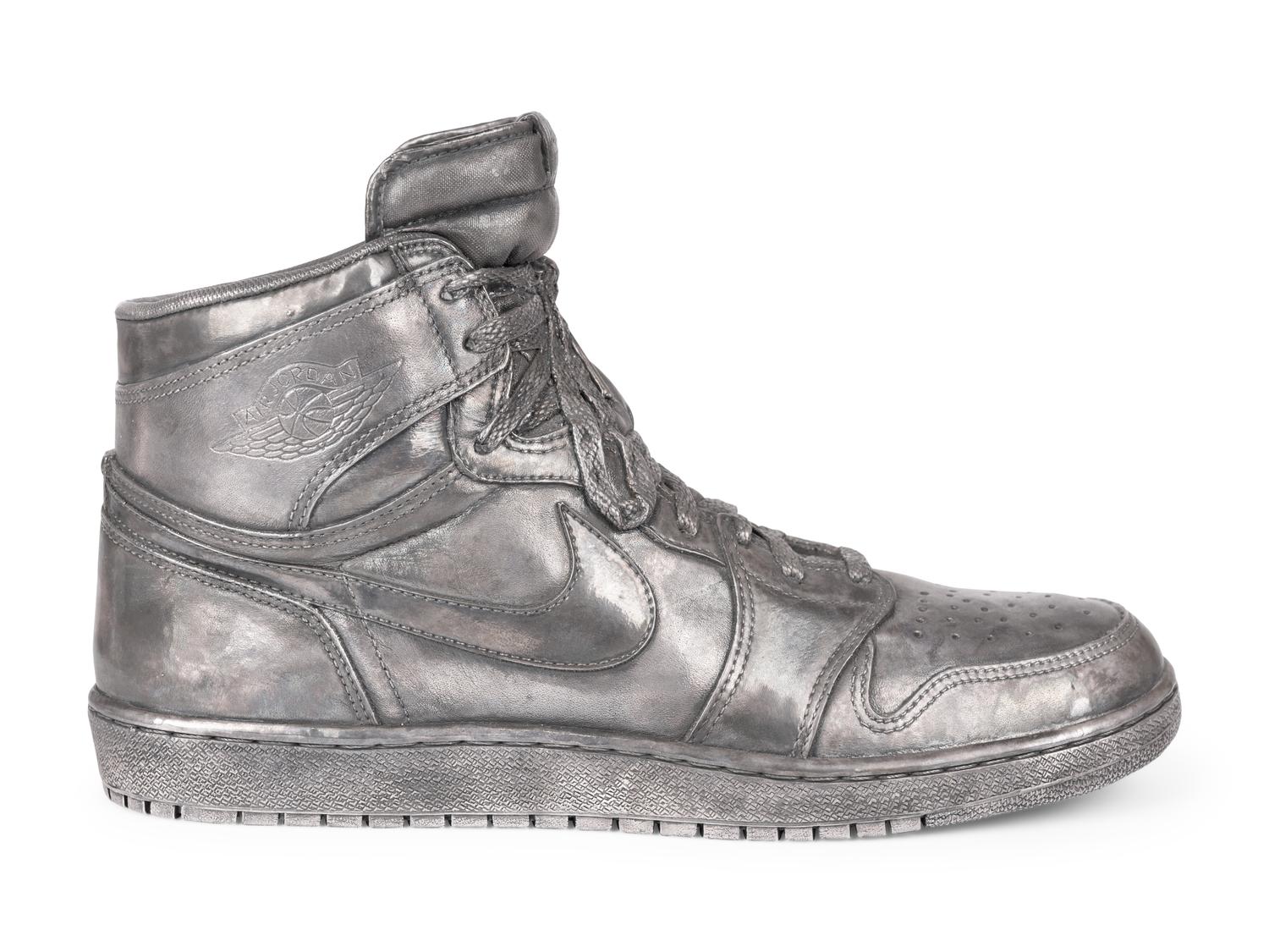 A Nike Air Jordan 1 Silver Cast Basketball Shoe Crafted for Michael Jordan's 32nd Birthday