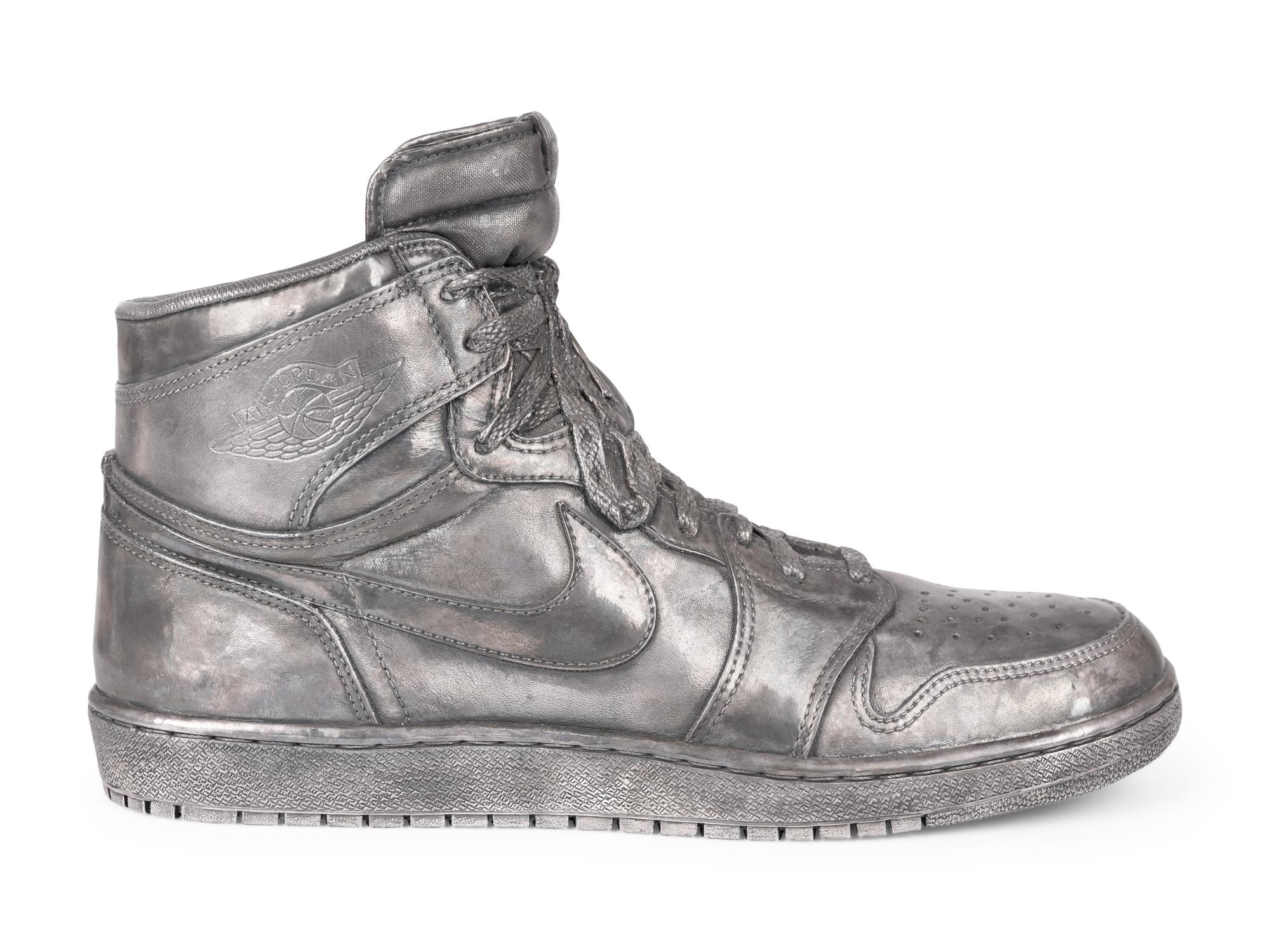 A Nike Air Jordan 1 Silver Cast Basketball Shoe Crafted for Michael Jordan's 32nd Birthday