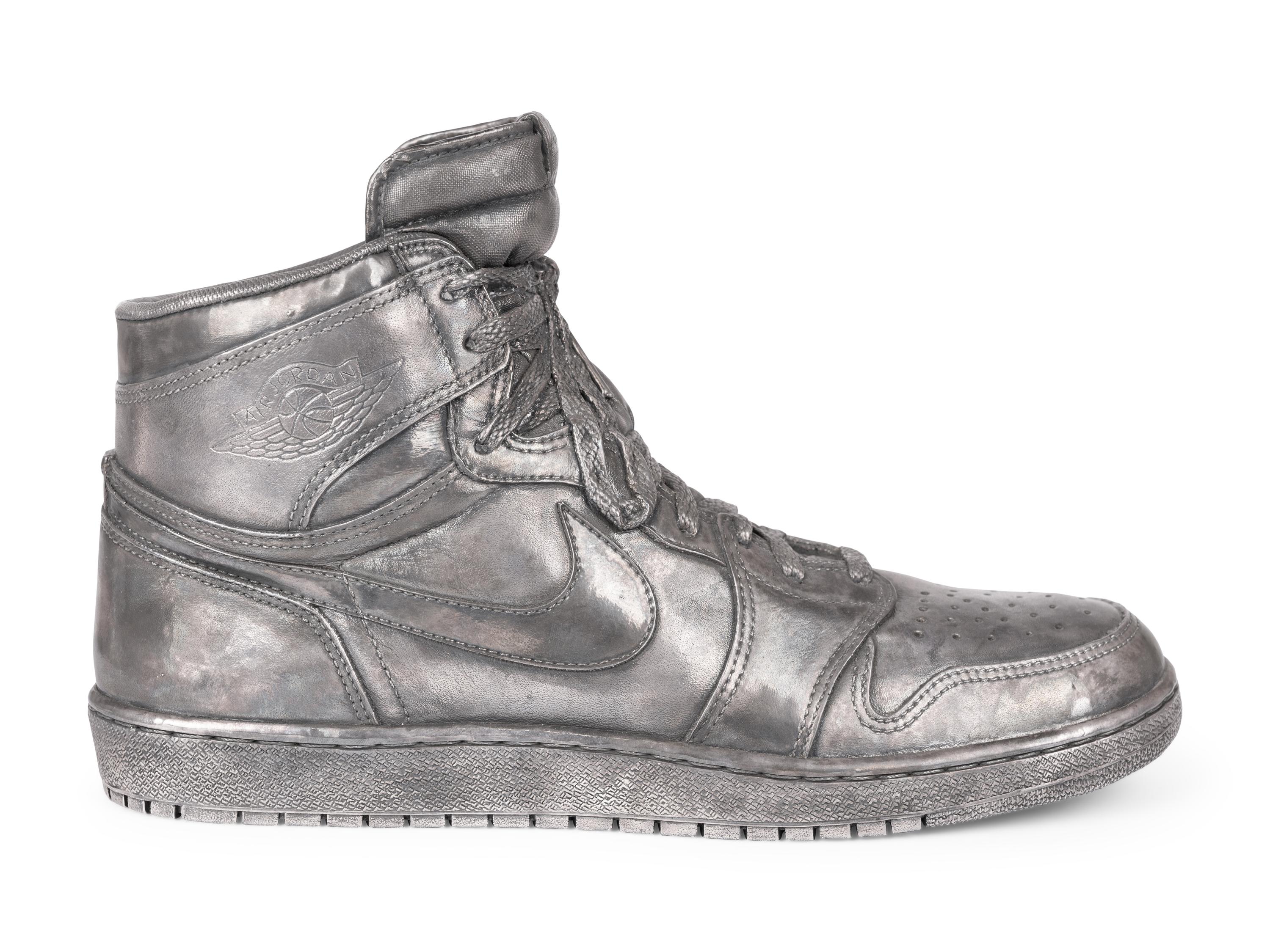 A Nike Air Jordan 1 Silver Cast Basketball Shoe Crafted for Michael Jordan's 32nd Birthday