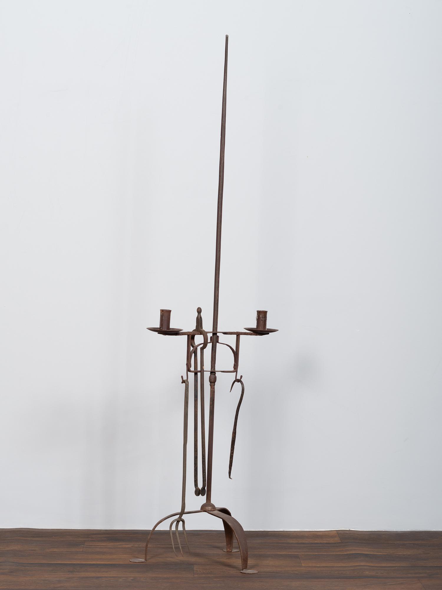 A Set of Wrought and Forged Iron Fireplace Tools on Stand