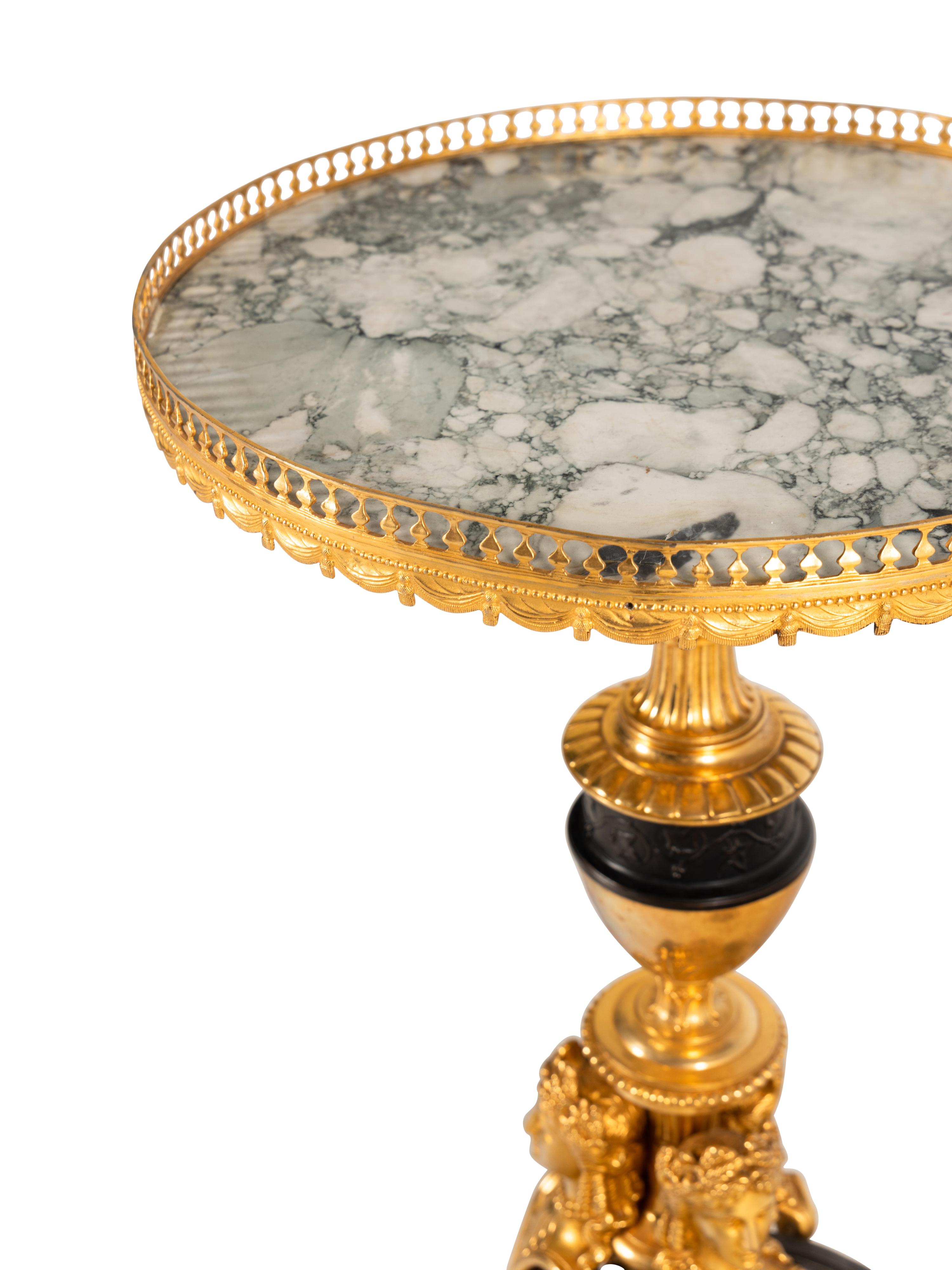 A Pair of French Neoclassical Style Gilt and Patinated Bronze Marble-Top Tables