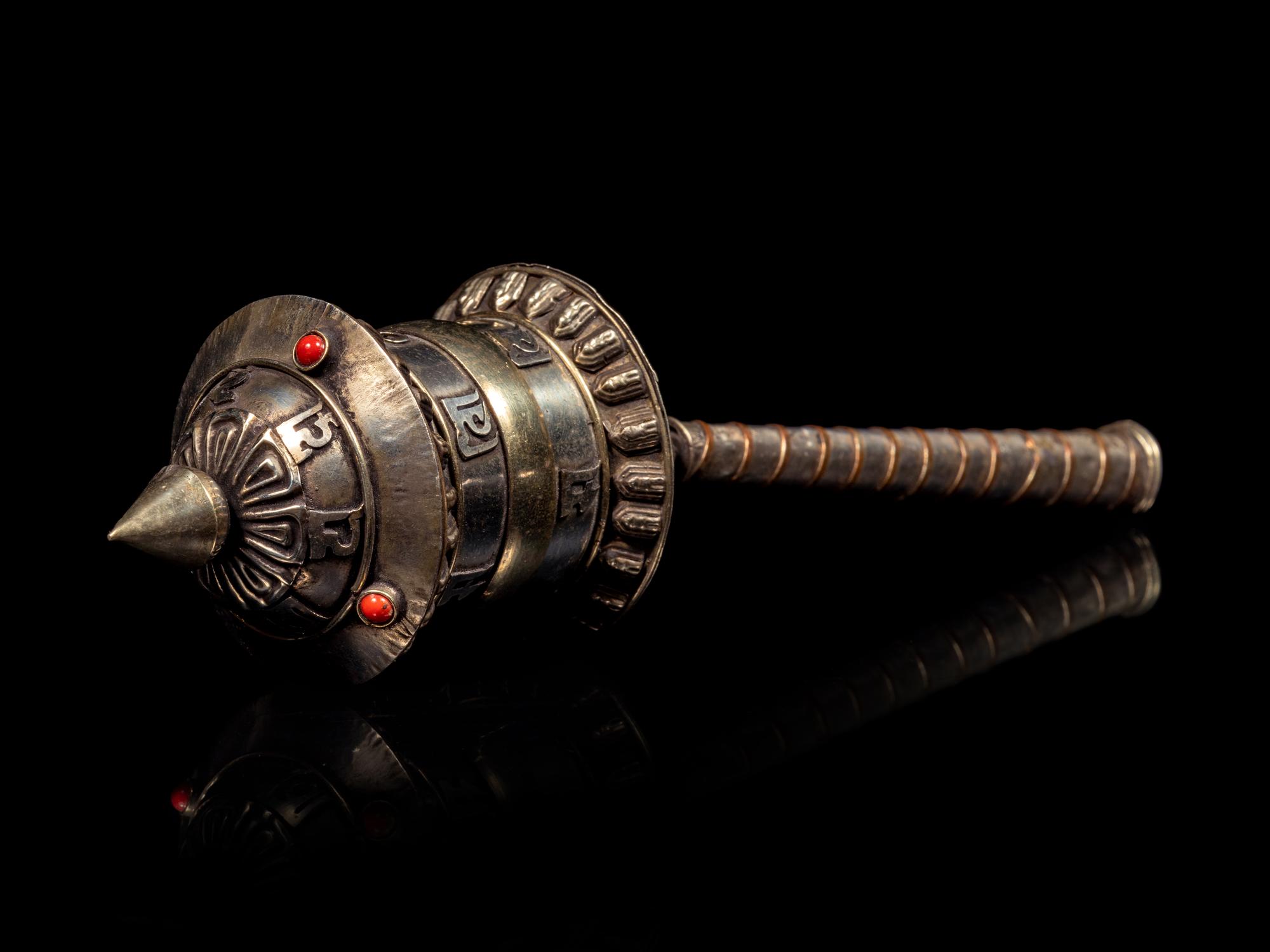 A Tibetan Silver Praying Wheel