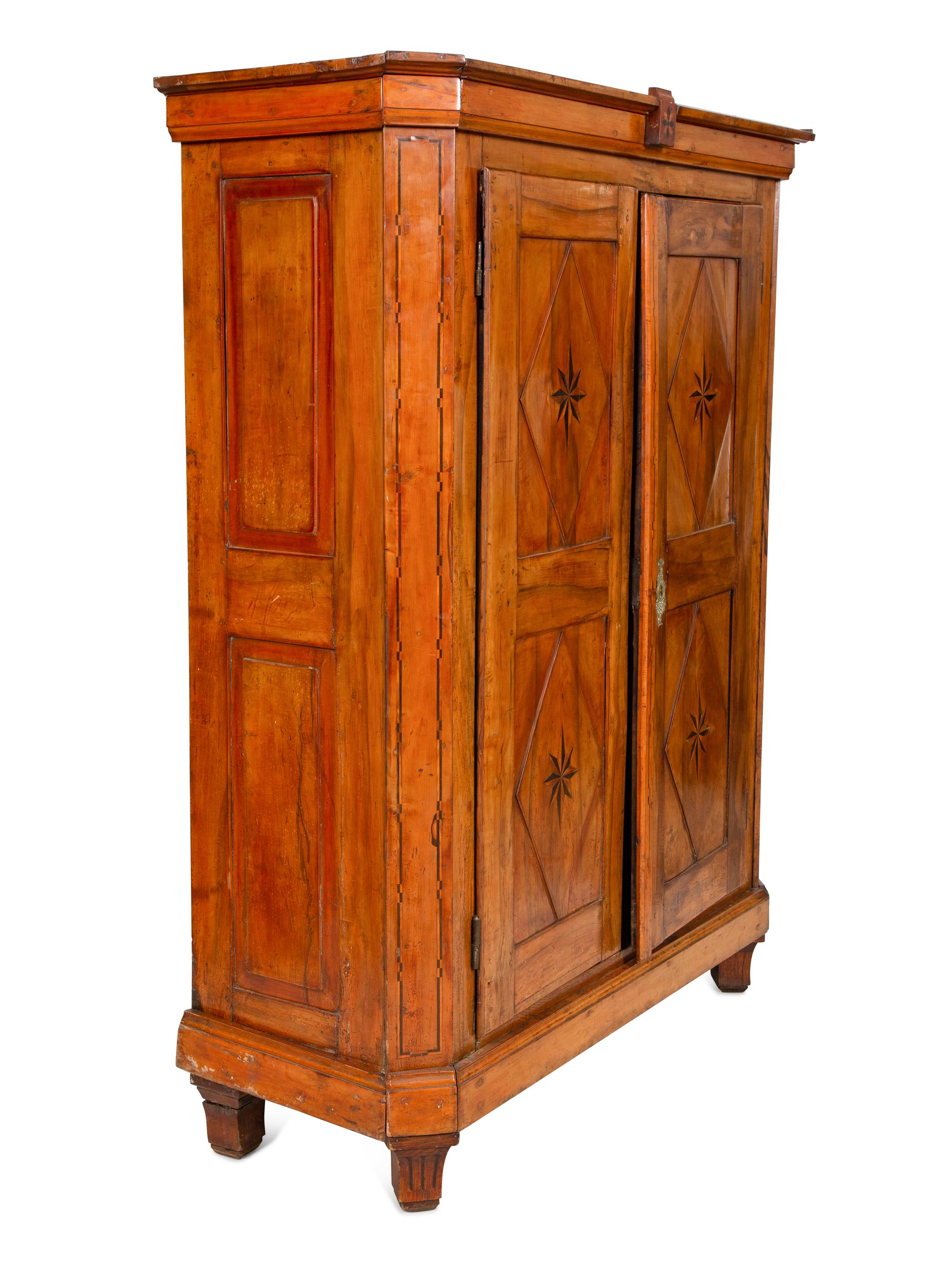 A Continental Olivewood Armoire