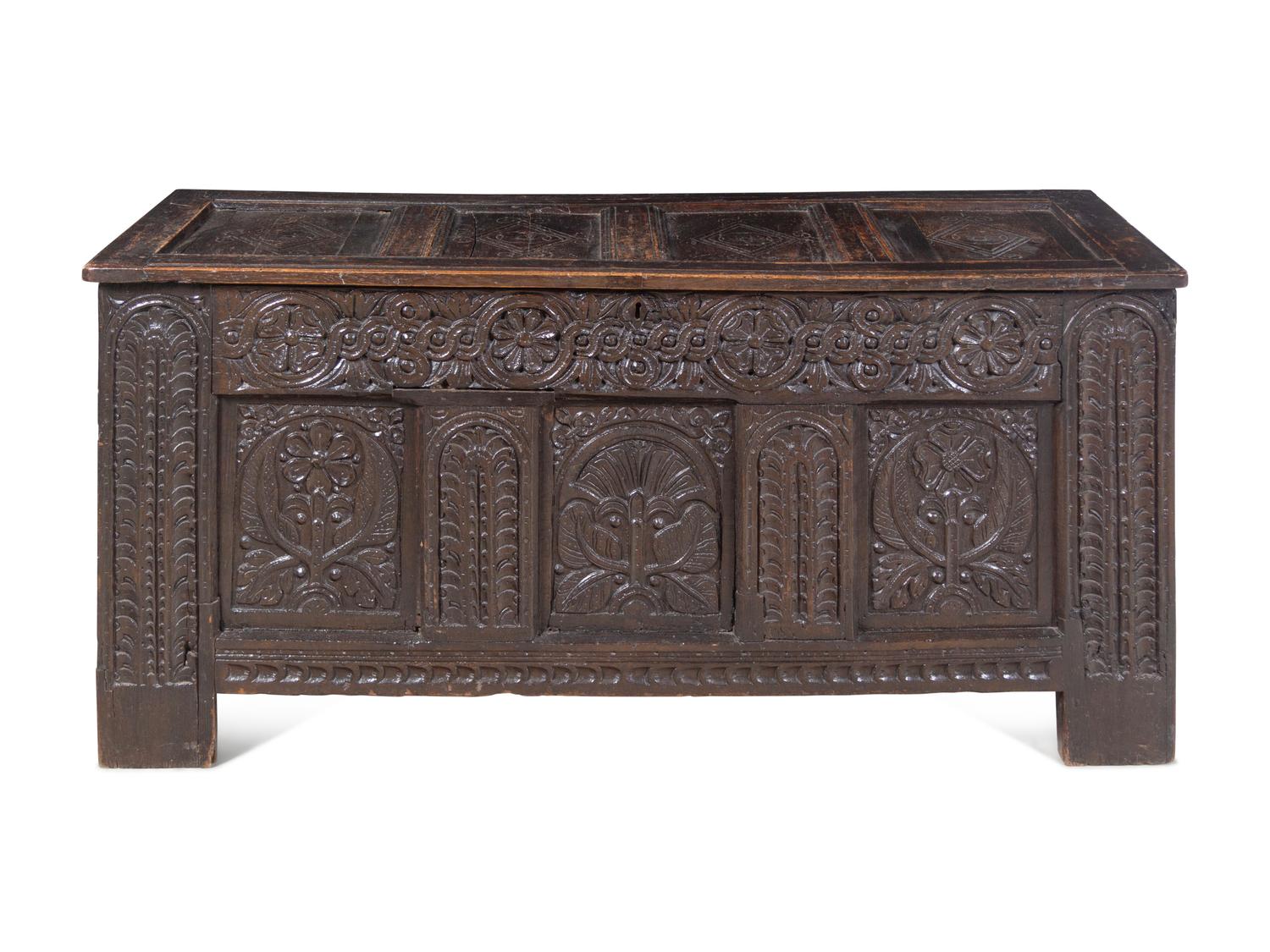 A Charles II Style Carved Oak Coffer