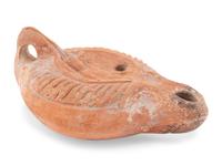 A Roman Terracotta Discus Lamp Depicting the God Hermes