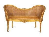 A Louis XV Style Caned Giltwood Settee