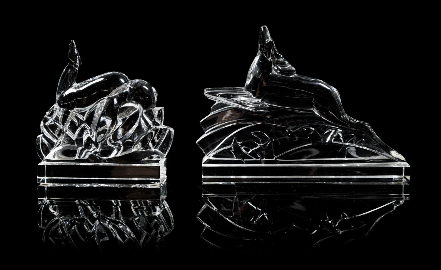 Baccarat, two Art Deco style glass figures, one depicting a leaping deer and the other grazing deer