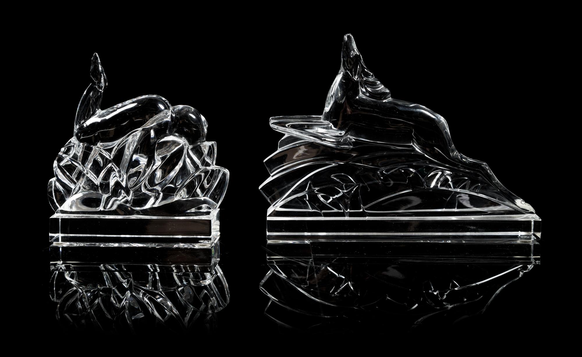 Baccarat, two Art Deco style glass figures, one depicting a leaping deer and the other grazing deer