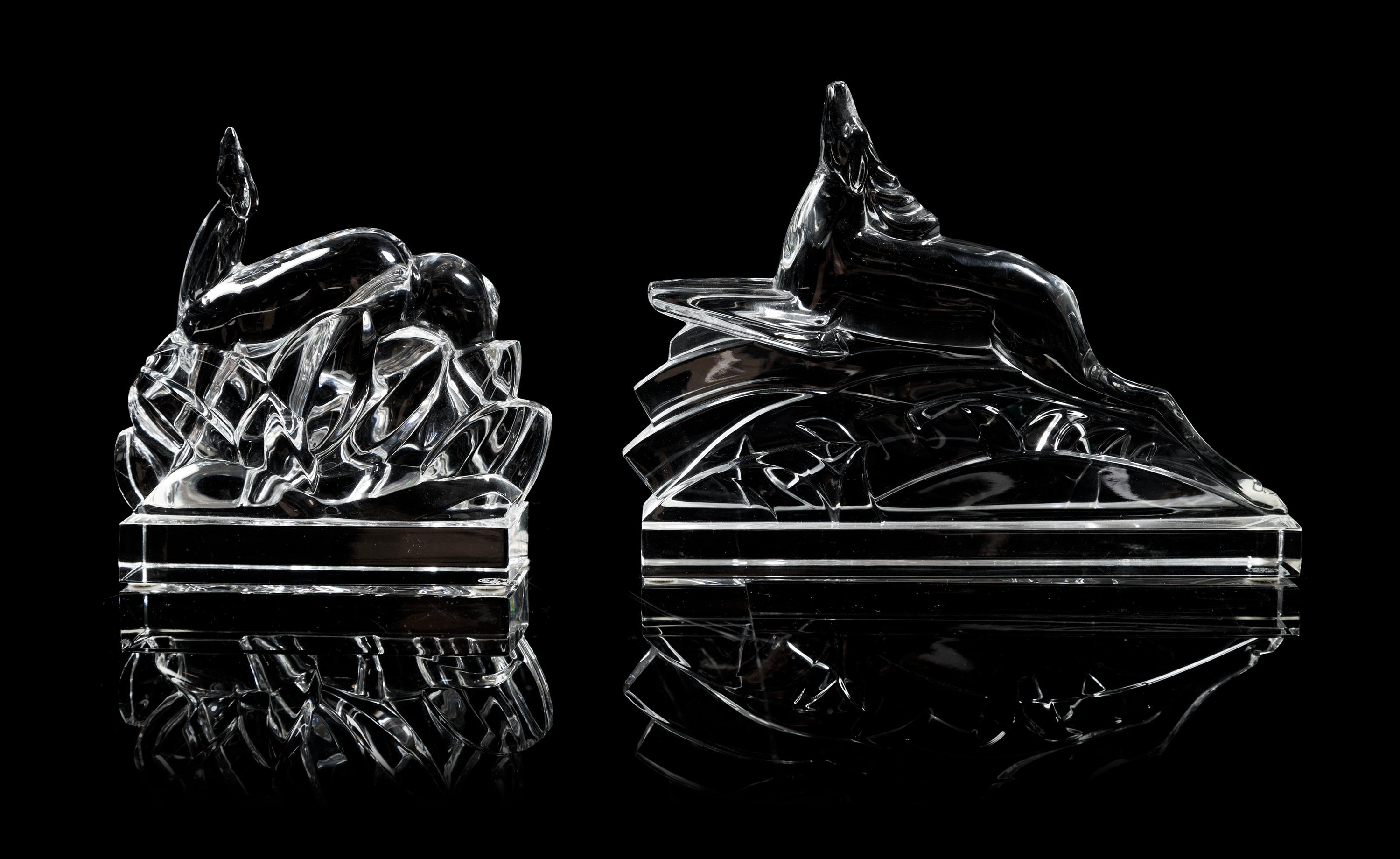 Baccarat, two Art Deco style glass figures, one depicting a leaping deer and the other grazing deer