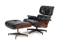 A Charles and Ray Eames for Herman Miller Leather Upholstered Lounge Chair and Ottoman Height of chair 34 inches.