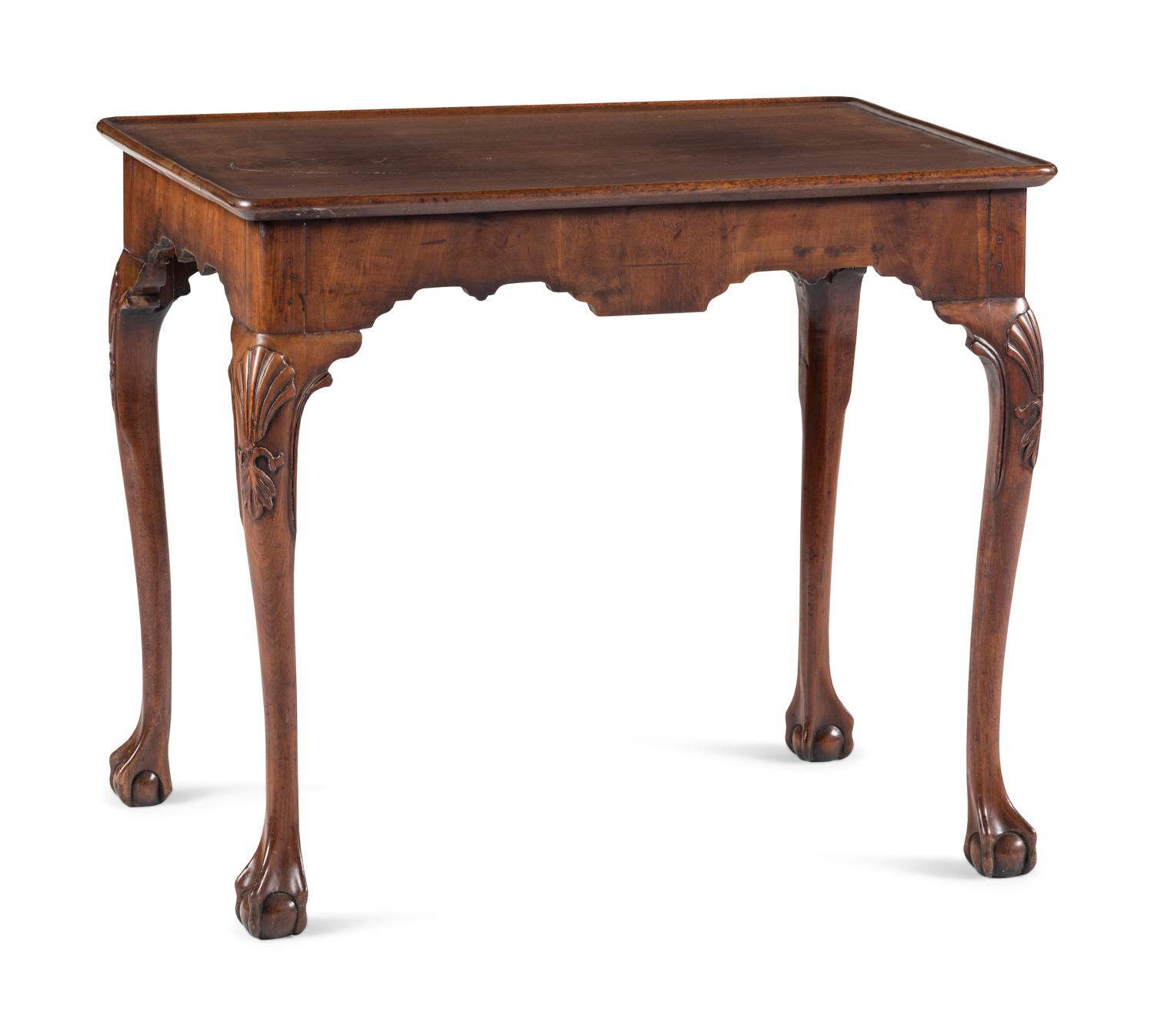 A Queen Anne Shell-Carved and Veneered Walnut Dish-Top Claw-and-Ball Foot Tea Table