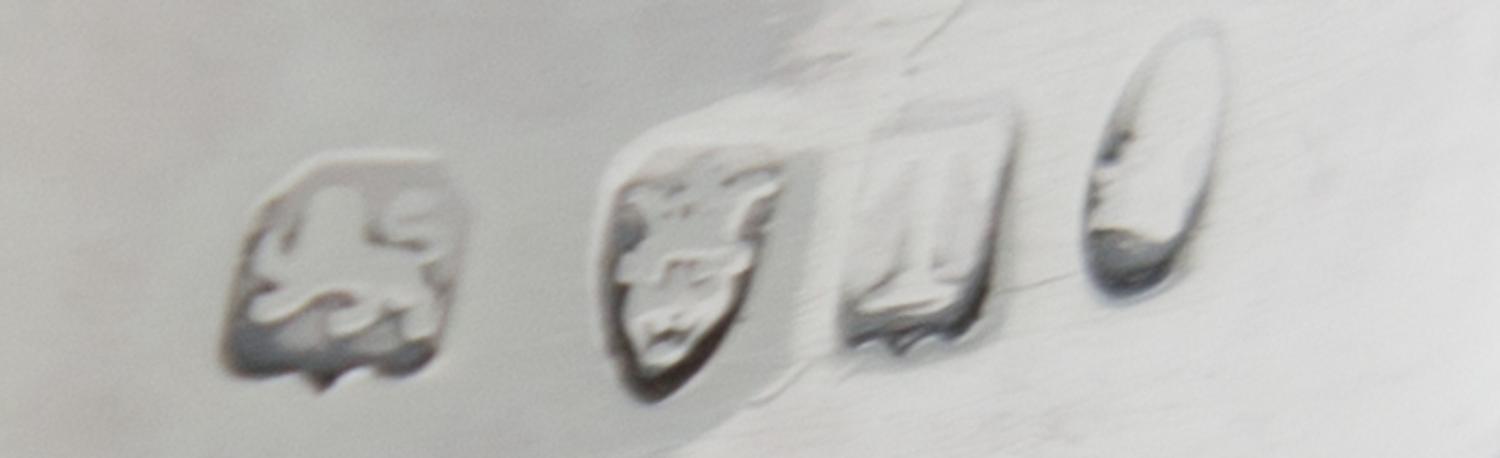 A George III Silver Creamer, Maker's Mark Obscured, London, 1814, the lower half of the body with ribbed decoration.