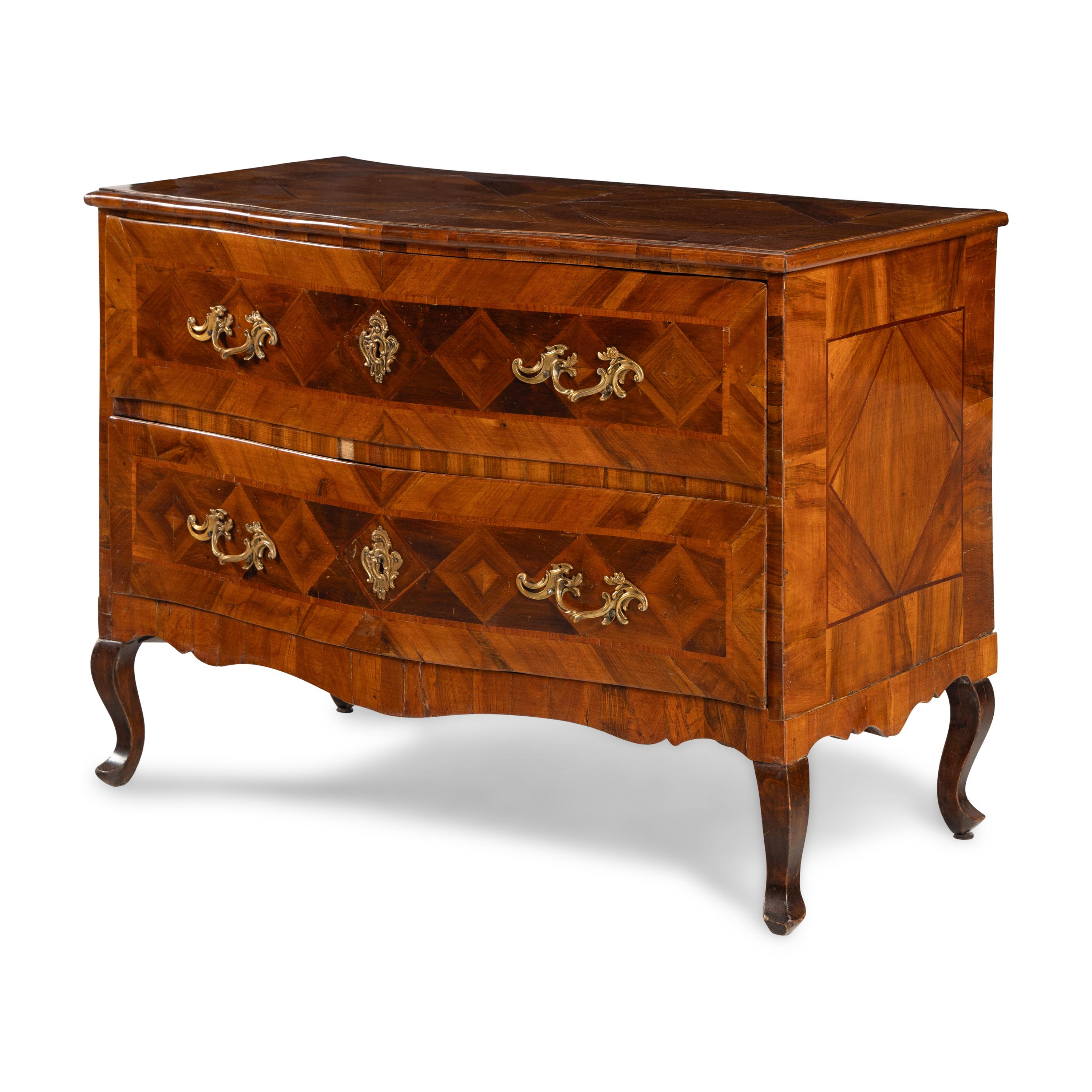 A Continental Parquetry Chest of Drawers