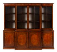 An English Mahogany Breakfront Bookcase Height 94 x width 103 x depth 23 1/3 inches. — 19TH CENTURY
