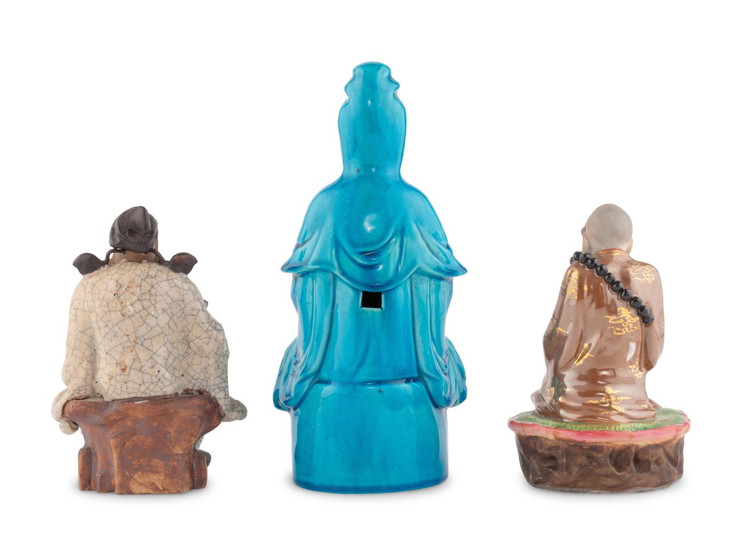 Three Chinese Porcelain and Stoneware Figures of Immortals