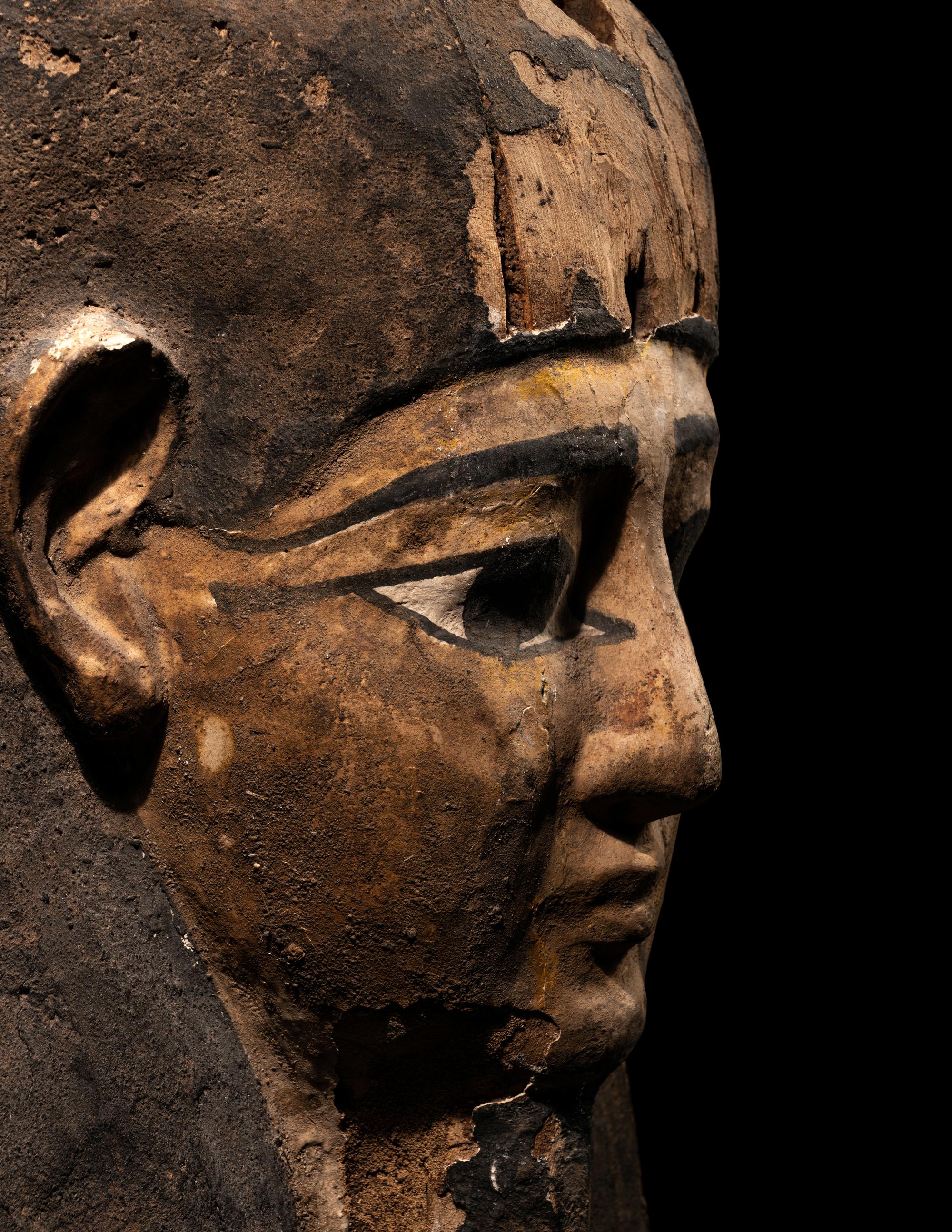 An Egyptian Painted Wood Mummy Mask