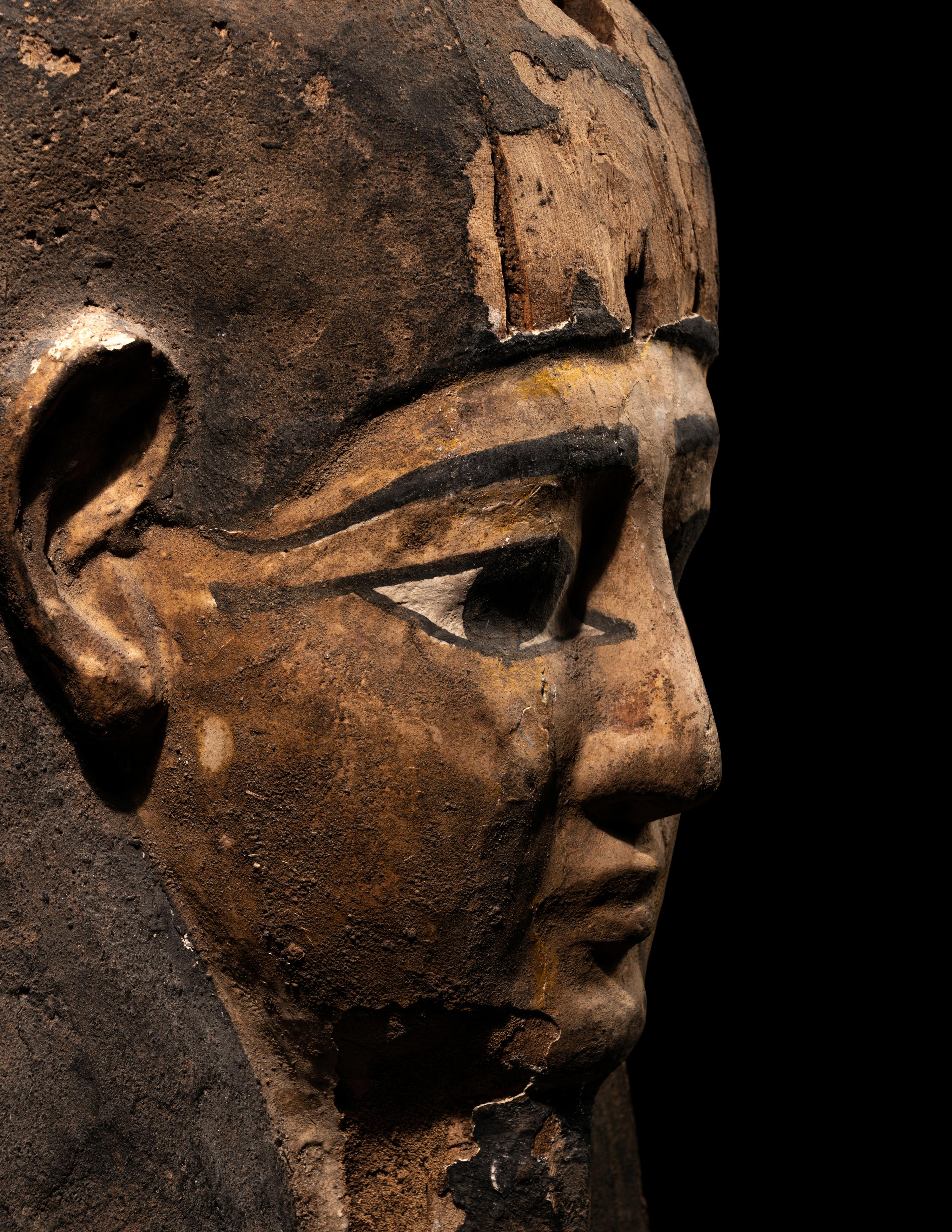 An Egyptian Painted Wood Mummy Mask
