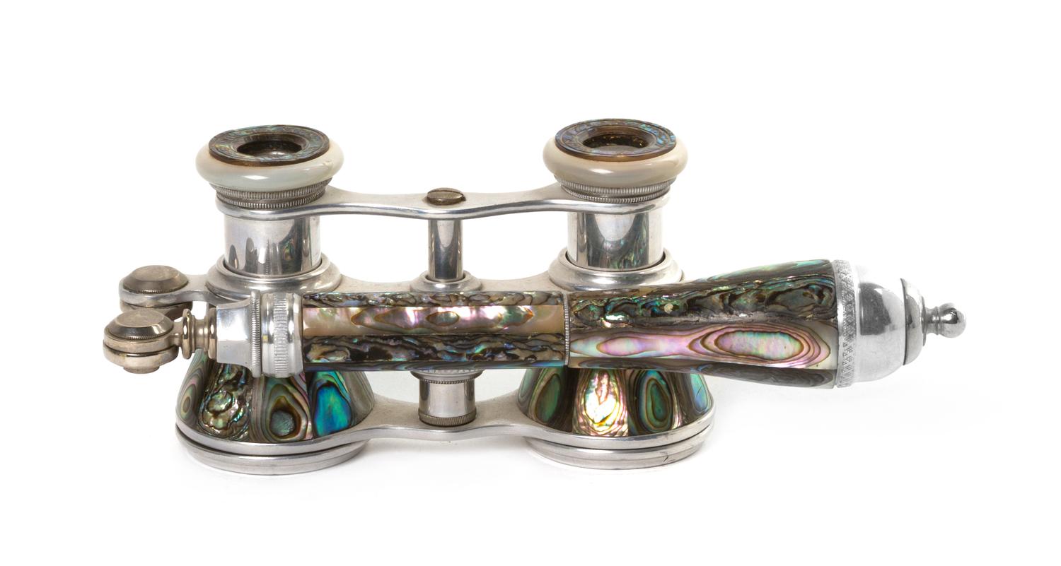 A Pair of French Mother-of-Pearl Veneered Opera Glasses, Aussie Jantin, Width 3 7/8 inches.