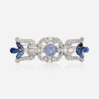 A star sapphire, sapphire, diamond, and platinum brooch, J.E. Caldwell & Co.