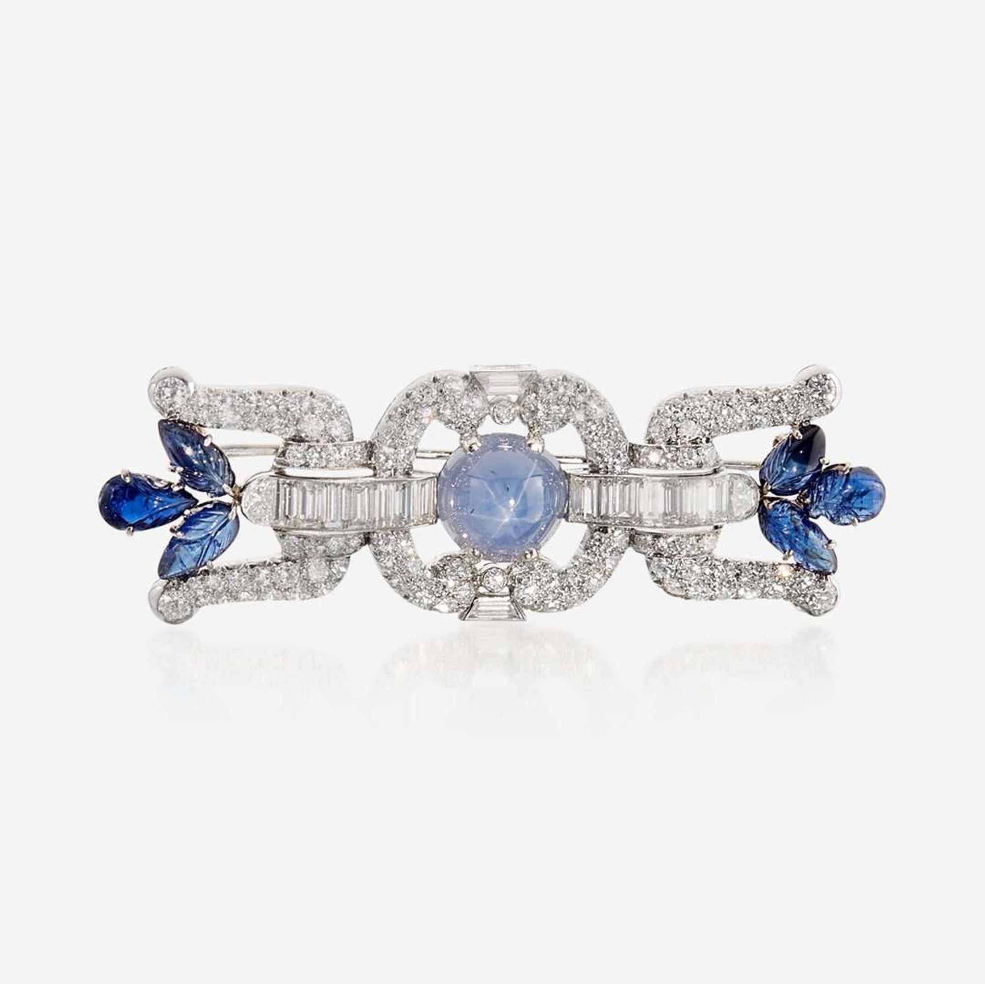 A star sapphire, sapphire, diamond, and platinum brooch, J.E. Caldwell & Co.