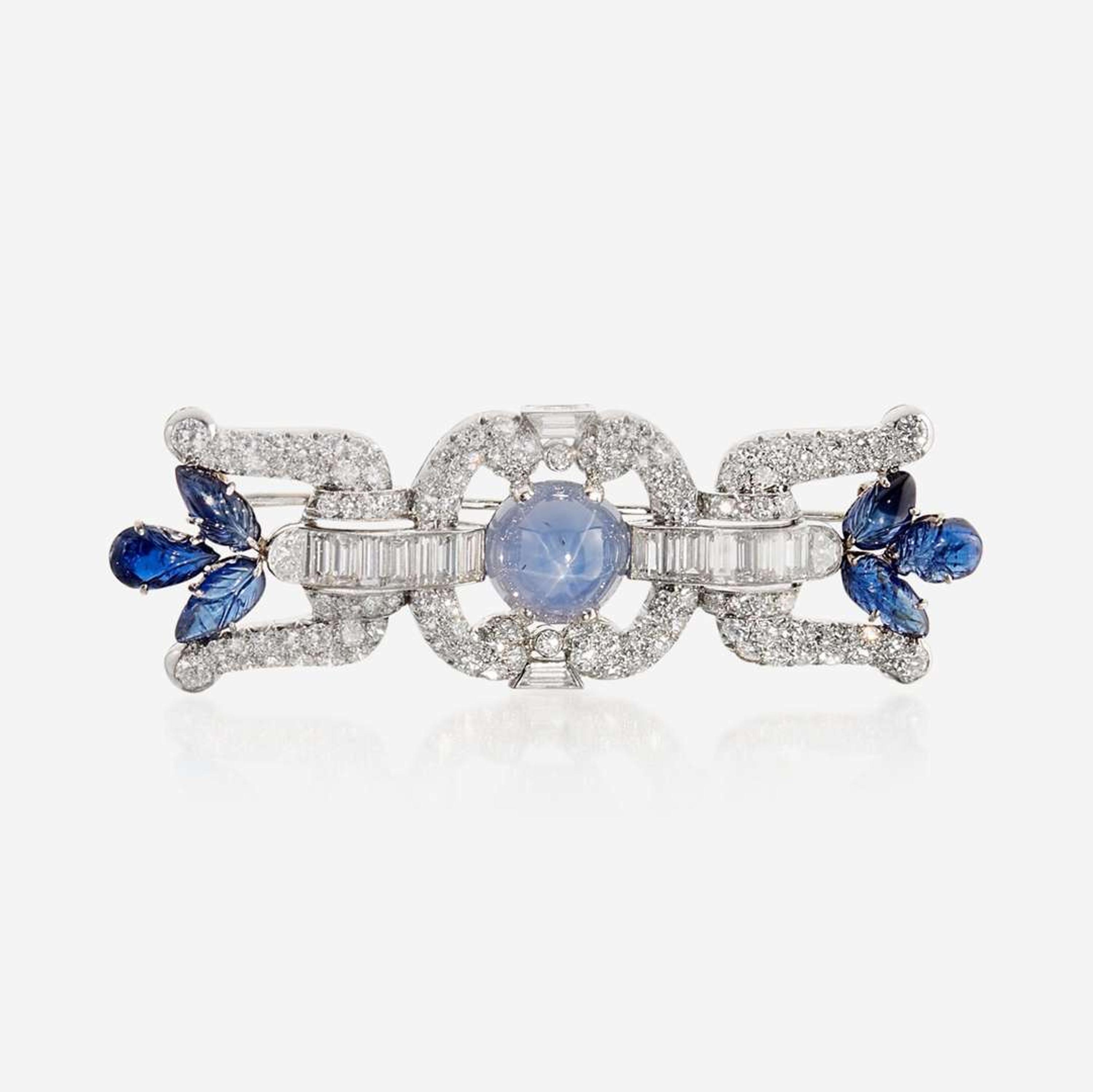 A star sapphire, sapphire, diamond, and platinum brooch, J.E. Caldwell & Co.