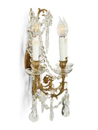 A Pair of Gilt Metal and Cut Glass Three-Light Wall Lights