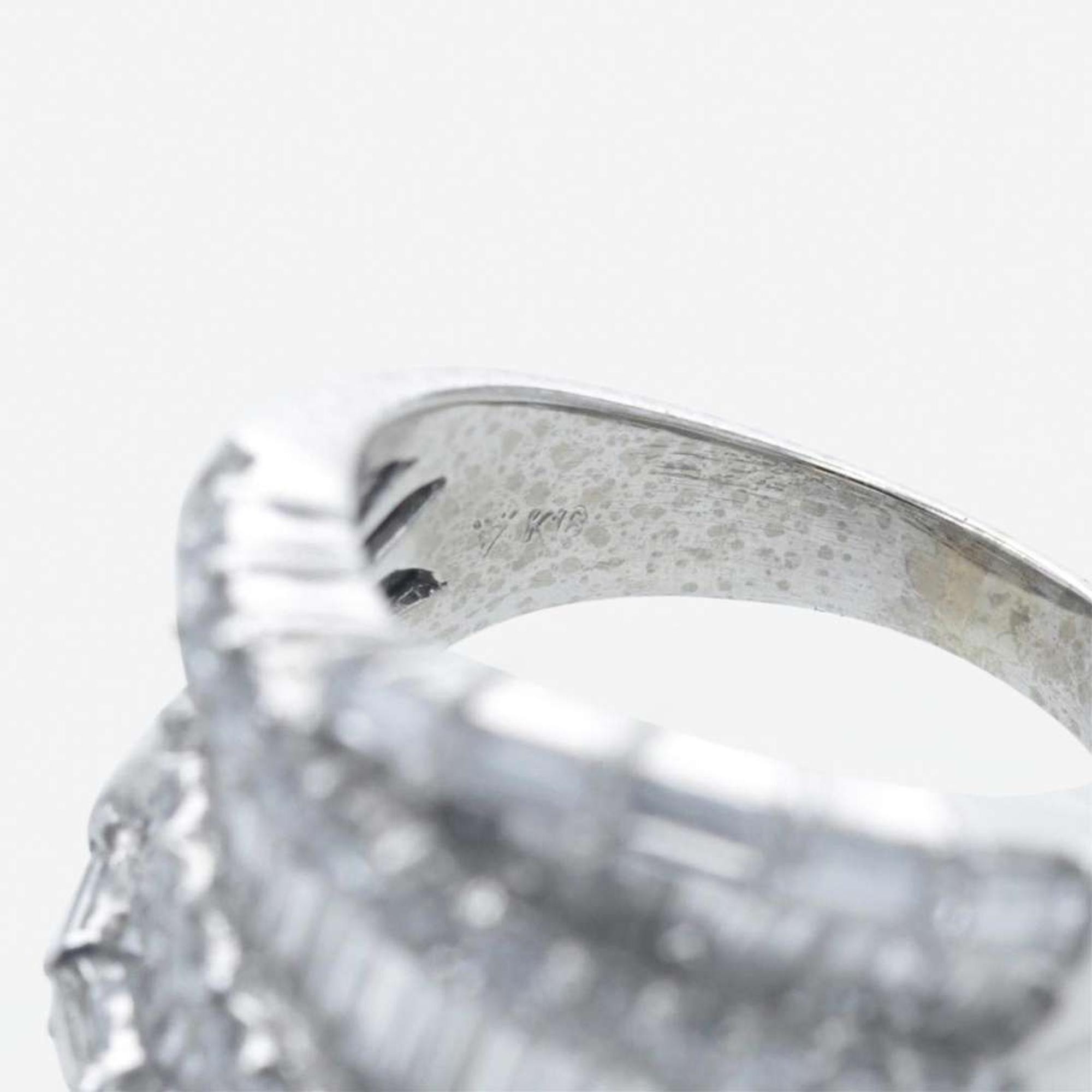 An 18K white gold and diamond ring
