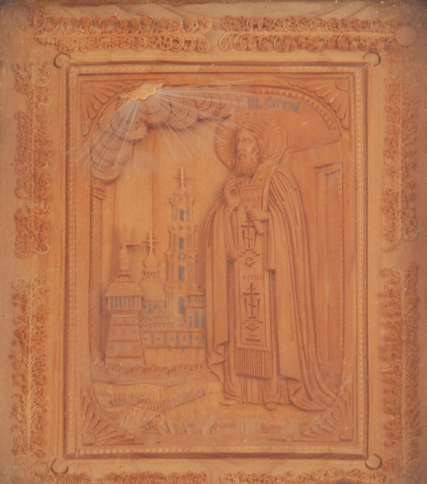A Carved Wooden Panel depicting a Russian Orthodox Saint