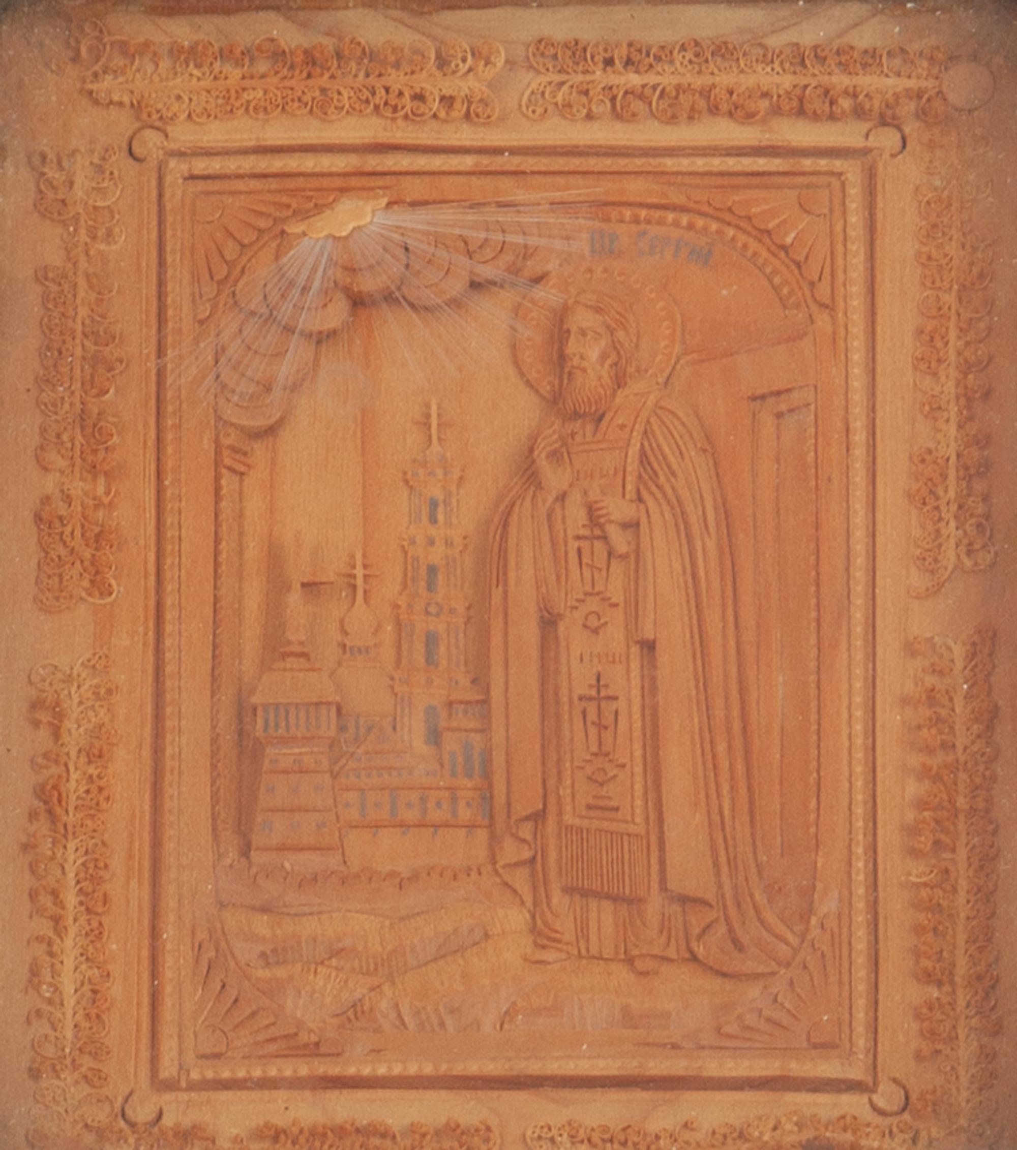 A Carved Wooden Panel depicting a Russian Orthodox Saint