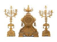 A Napoleon III Gilt Bronze Clock Garniture