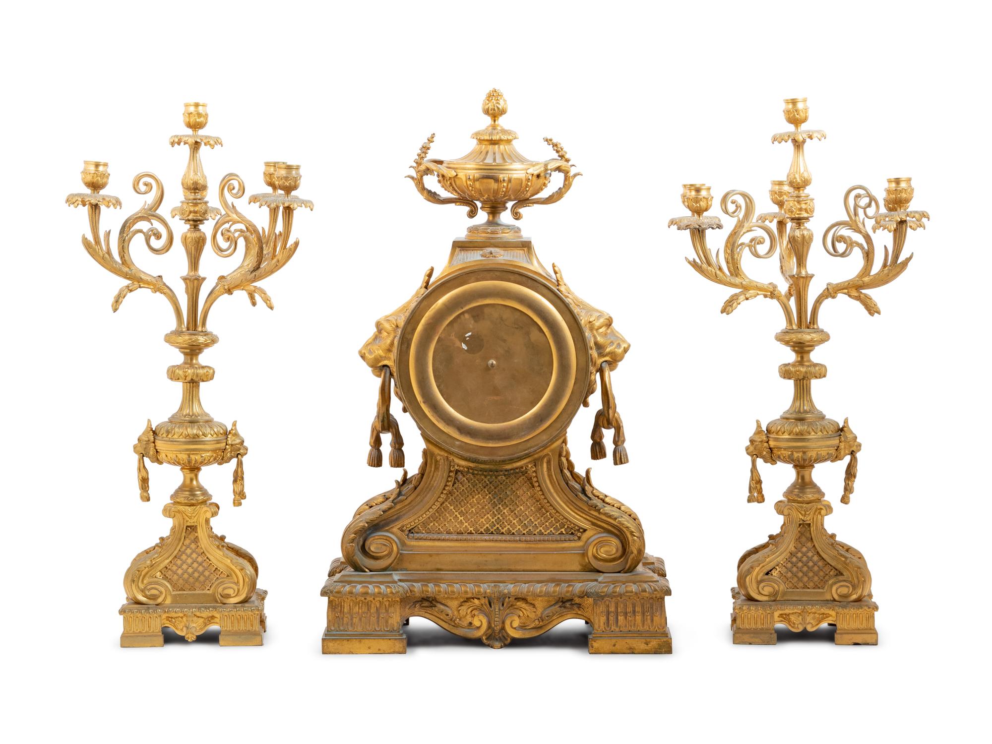 A Napoleon III Gilt Bronze Clock Garniture