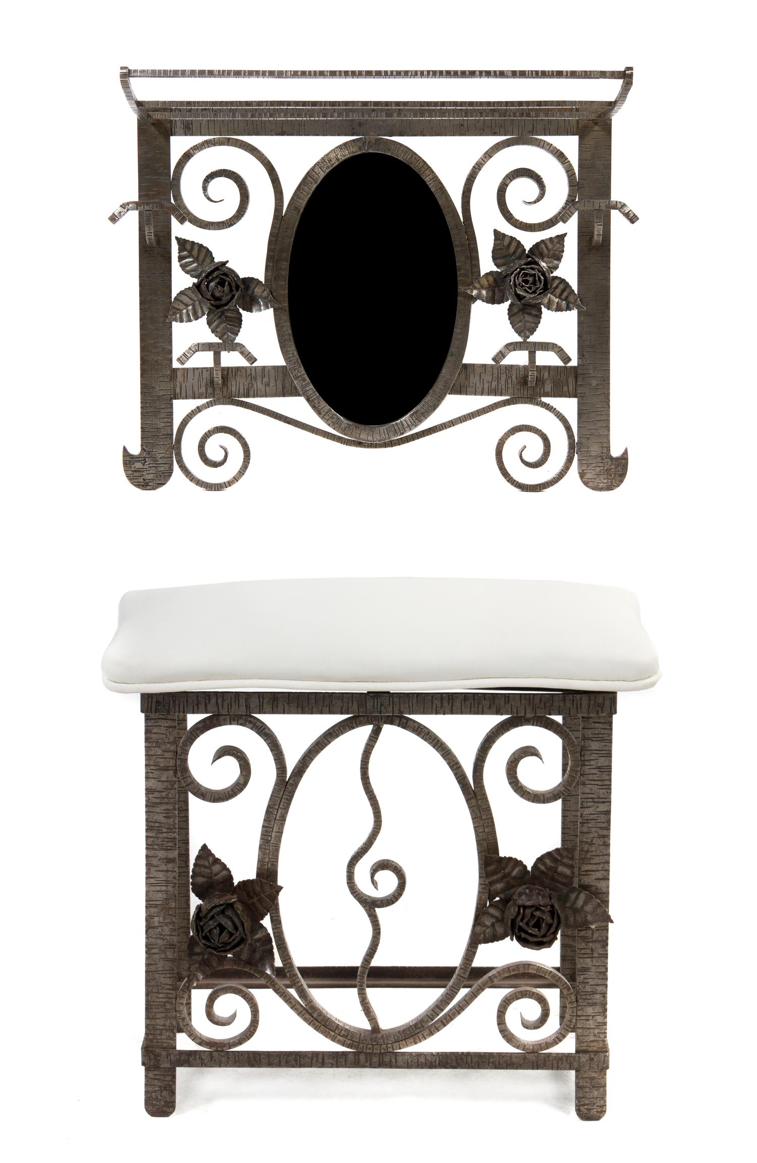 An Art Deco Style Silvered Metal Hall Tree, in the manner of Oscar Bach, Height of wall mount 20 1/2 x width 26 1/2 inches.