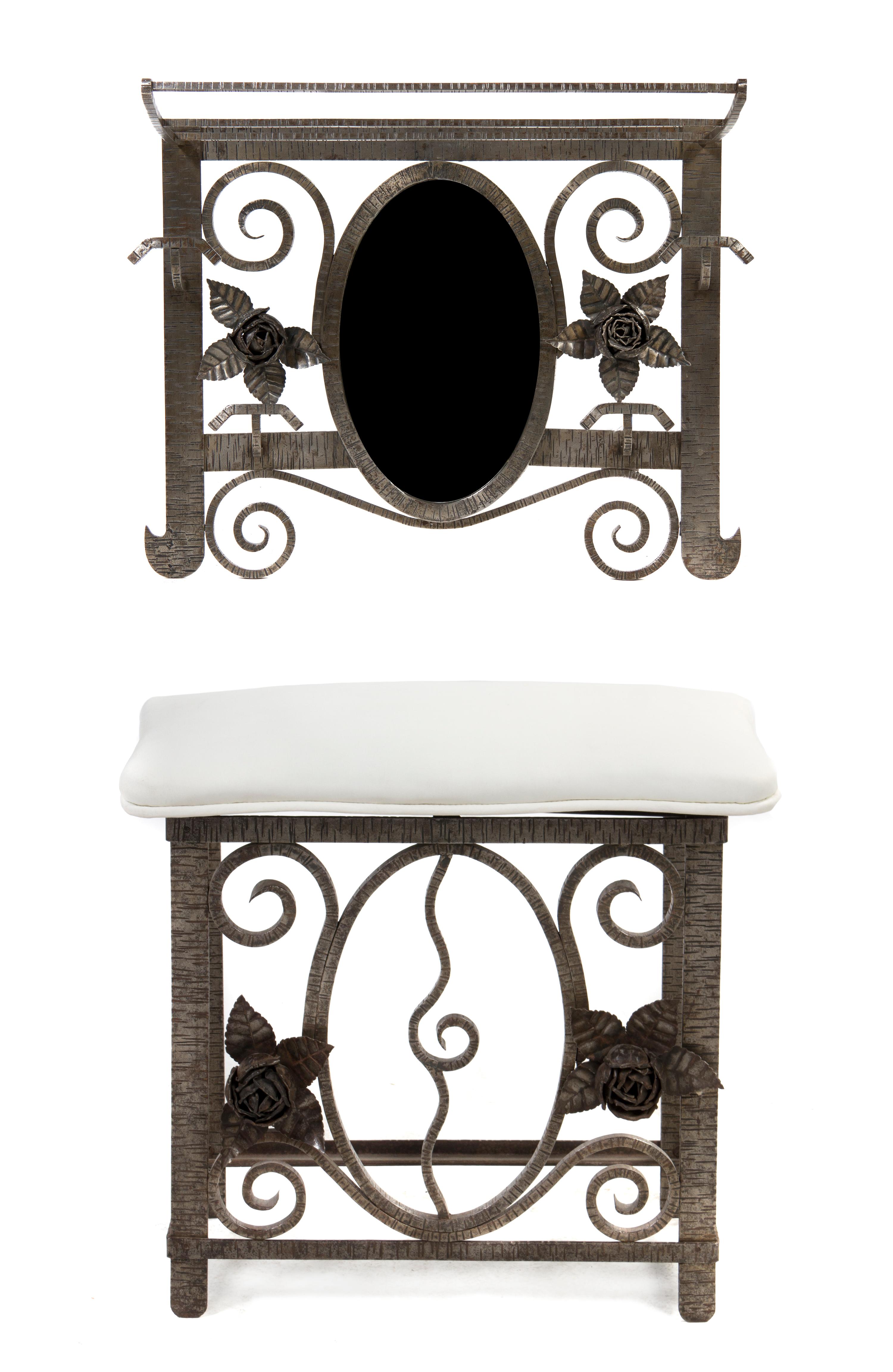An Art Deco Style Silvered Metal Hall Tree, in the manner of Oscar Bach, Height of wall mount 20 1/2 x width 26 1/2 inches.