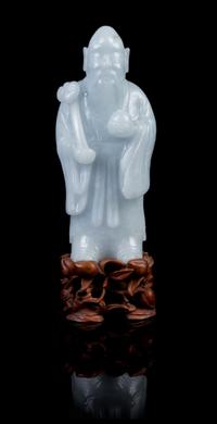 A Chinese Jadeite Figure of Immortal Shoulao LATE 19TH/EARLY 20TH CENTURY Height of jadeite 6 inches. — LATE 19TH/EARLY 20TH CENTURY